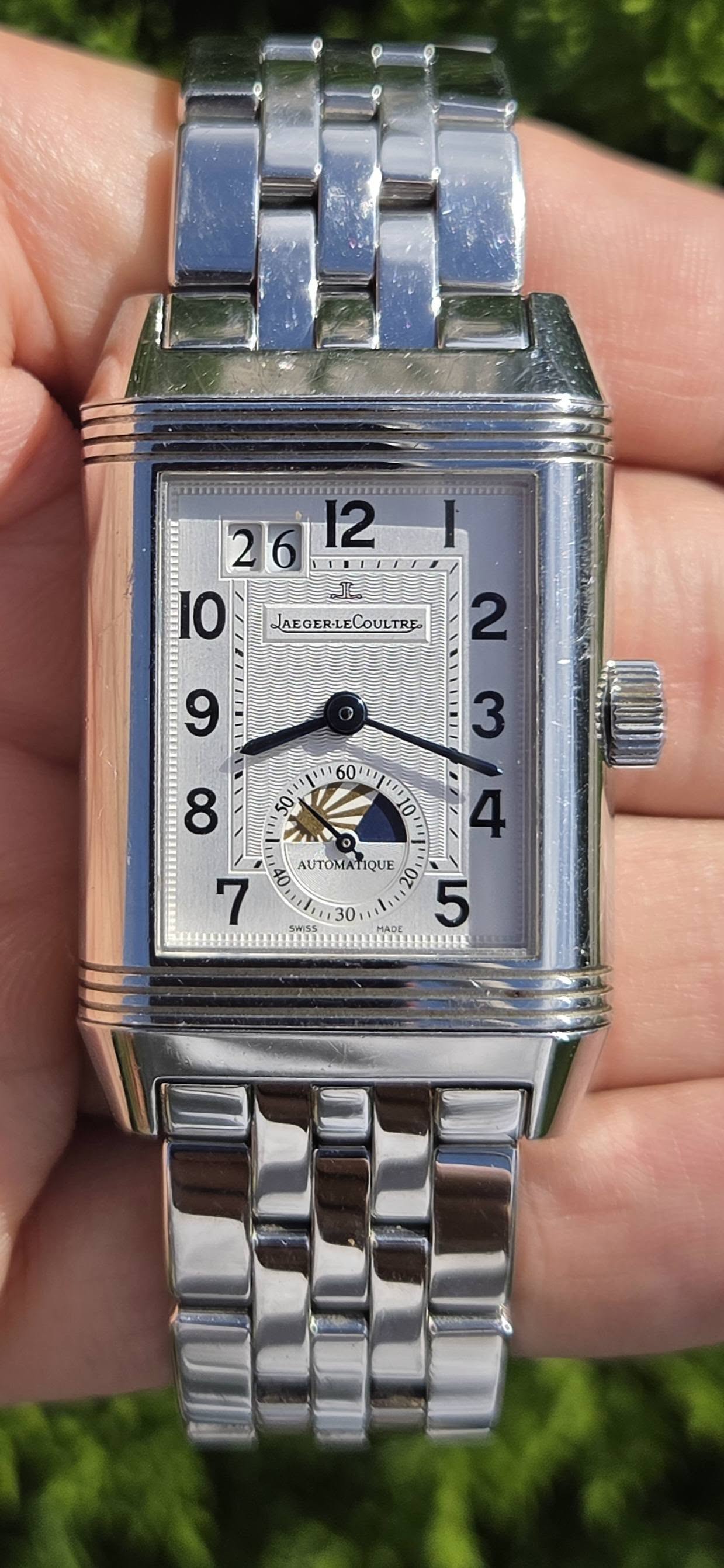 May be an image of digital watch and text