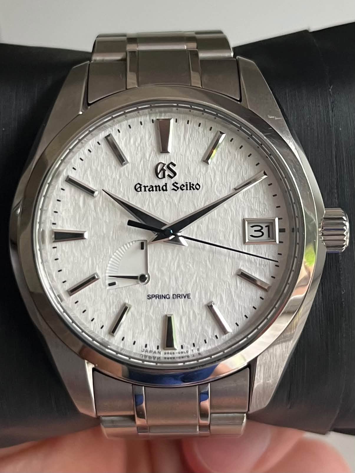 May be an image of wrist watch and text