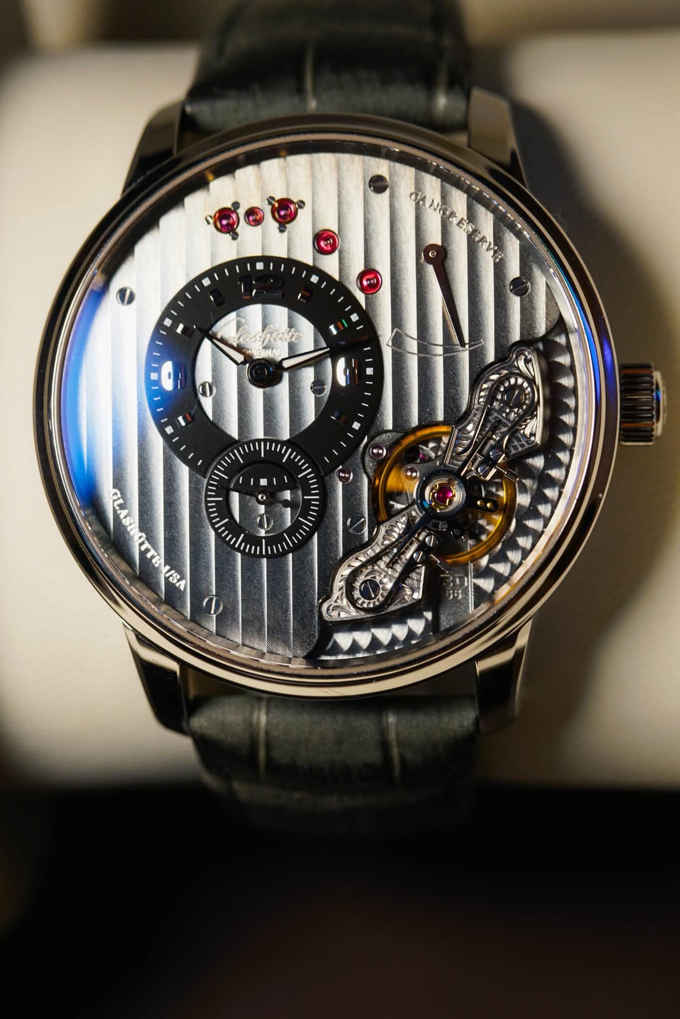 May be an image of wrist watch and text