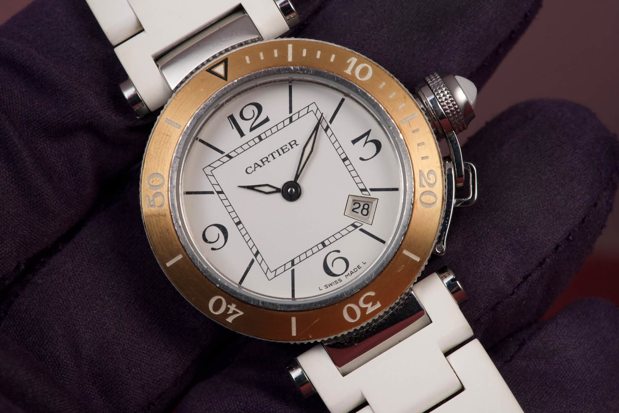 May be an image of wrist watch and text