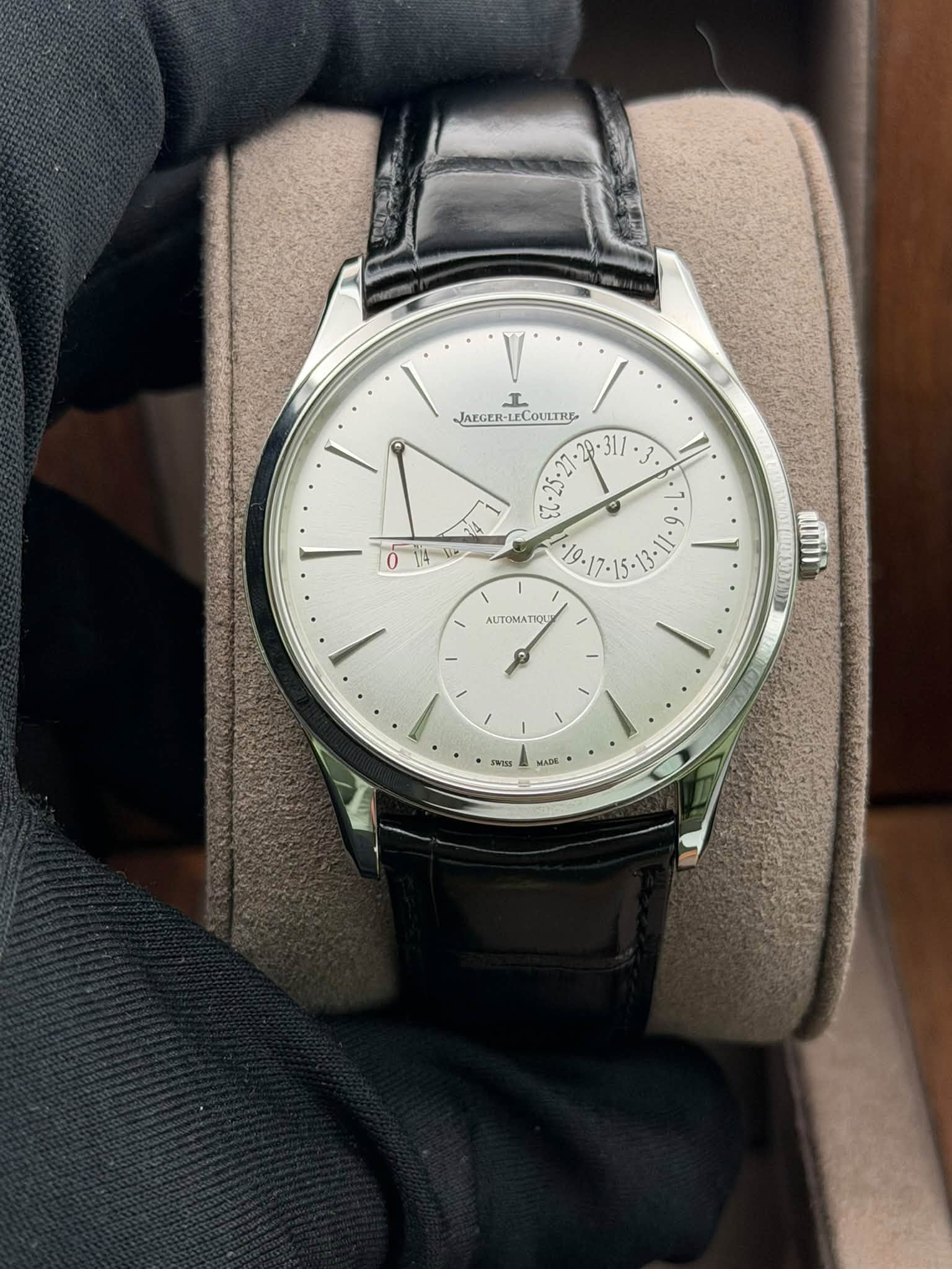 May be an image of wrist watch and text