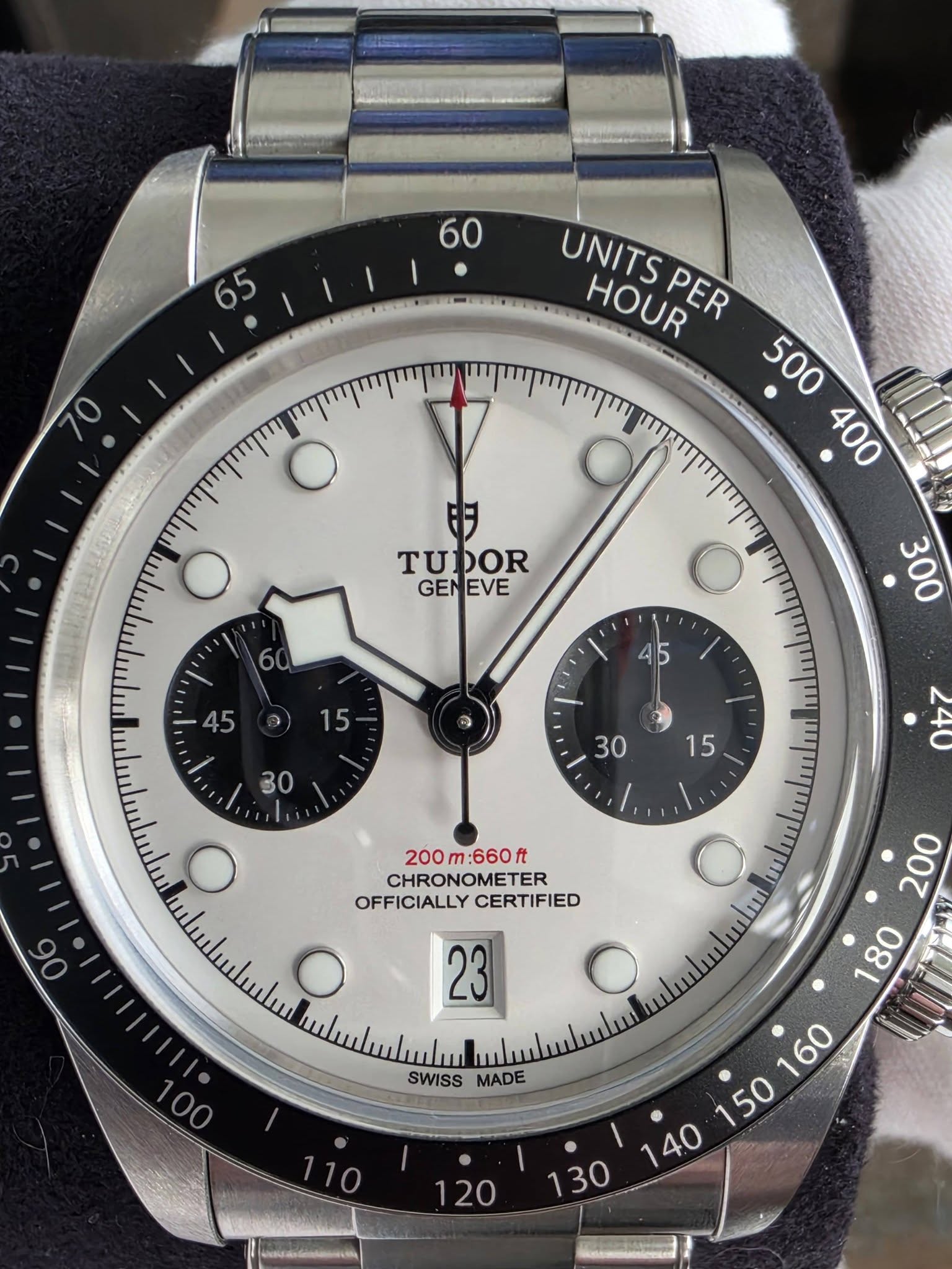 May be an image of wrist watch and text