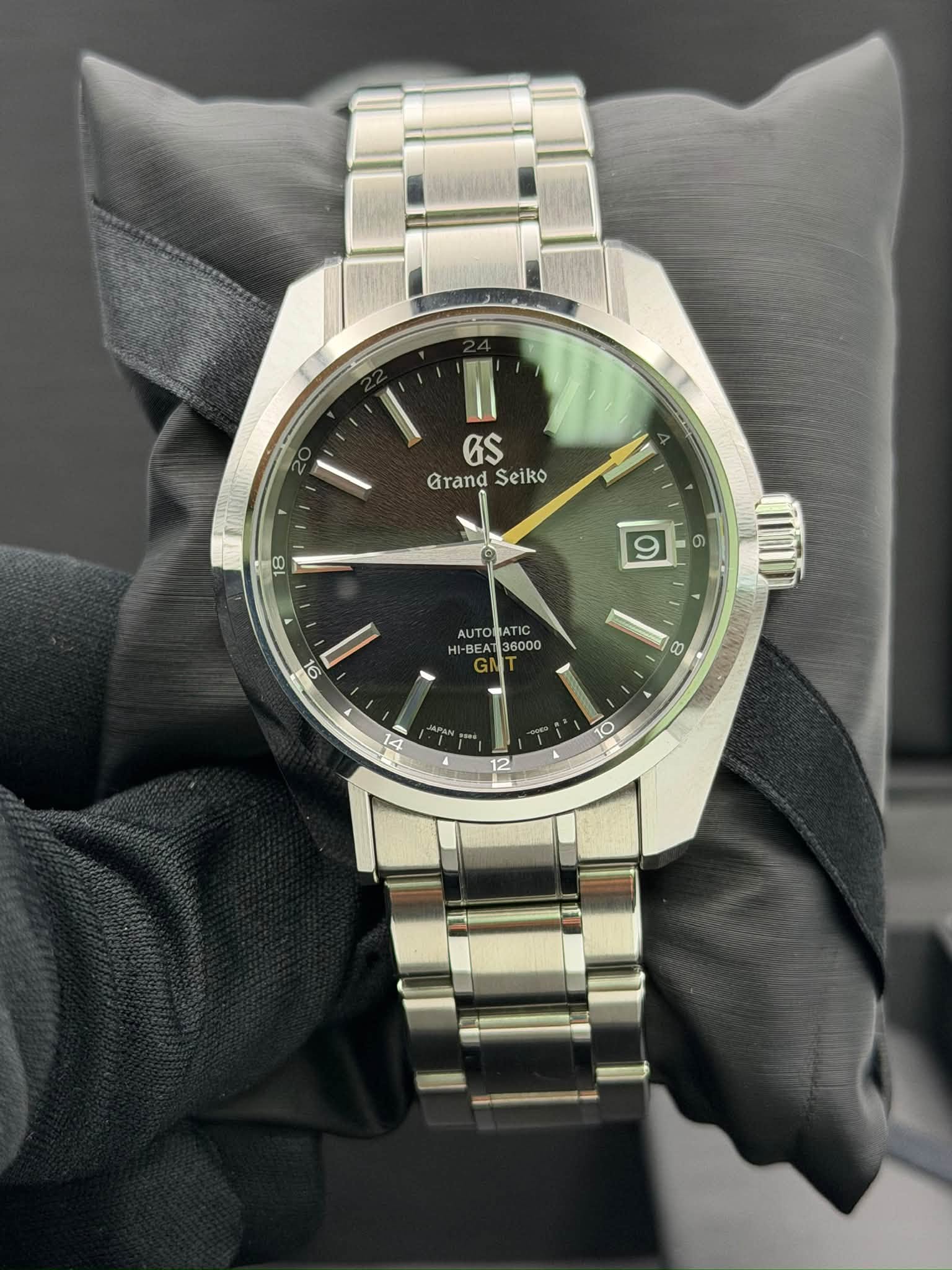 May be an image of wrist watch and text
