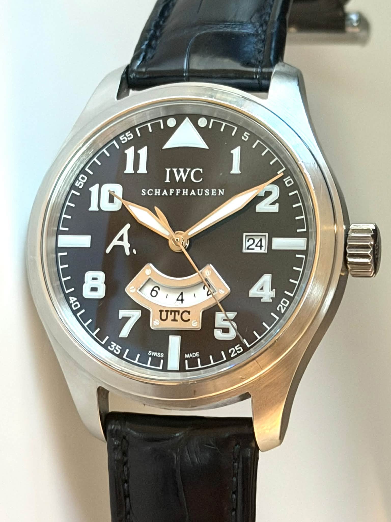 May be an image of wrist watch and text