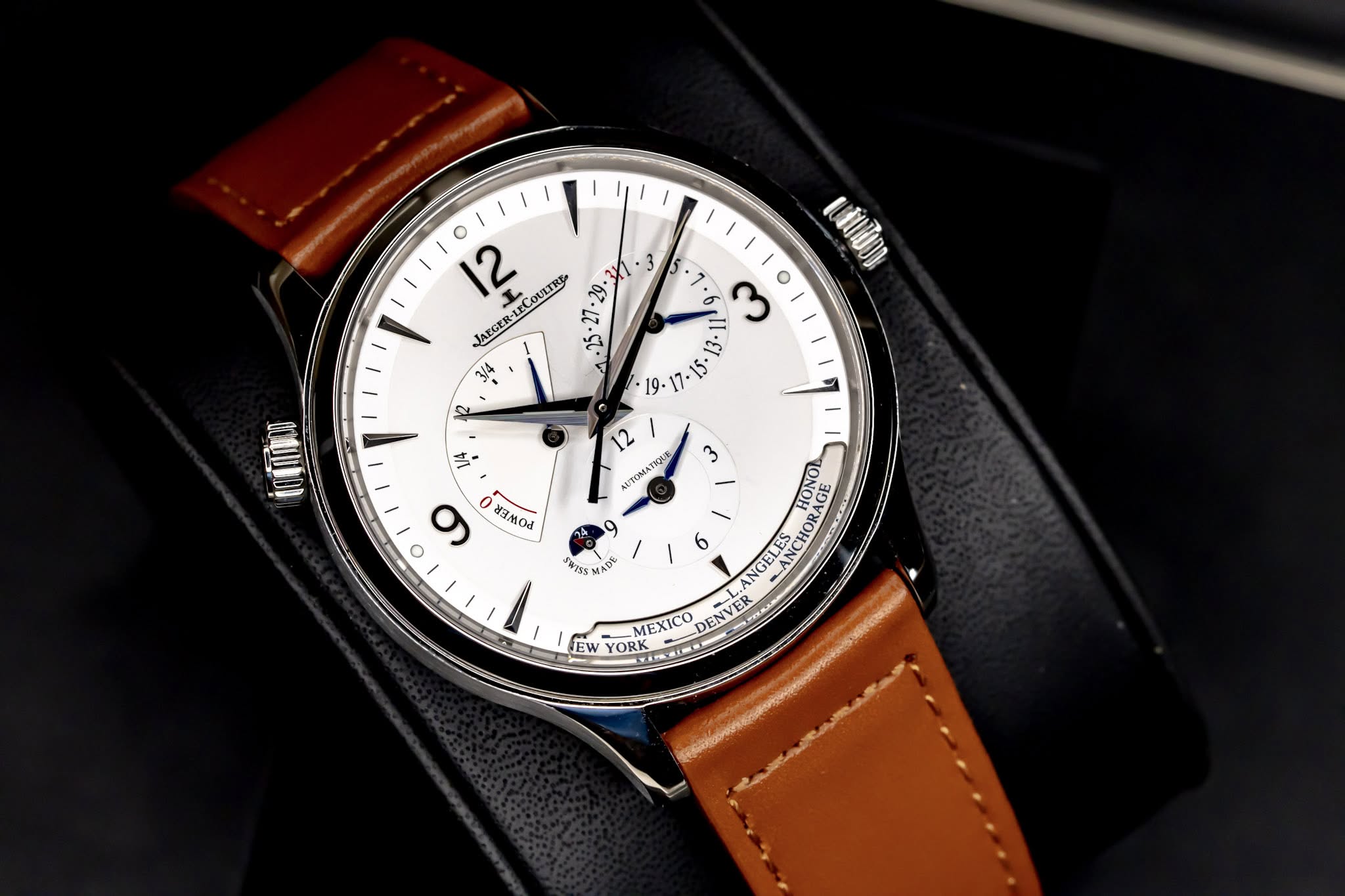 May be an image of wrist watch and text