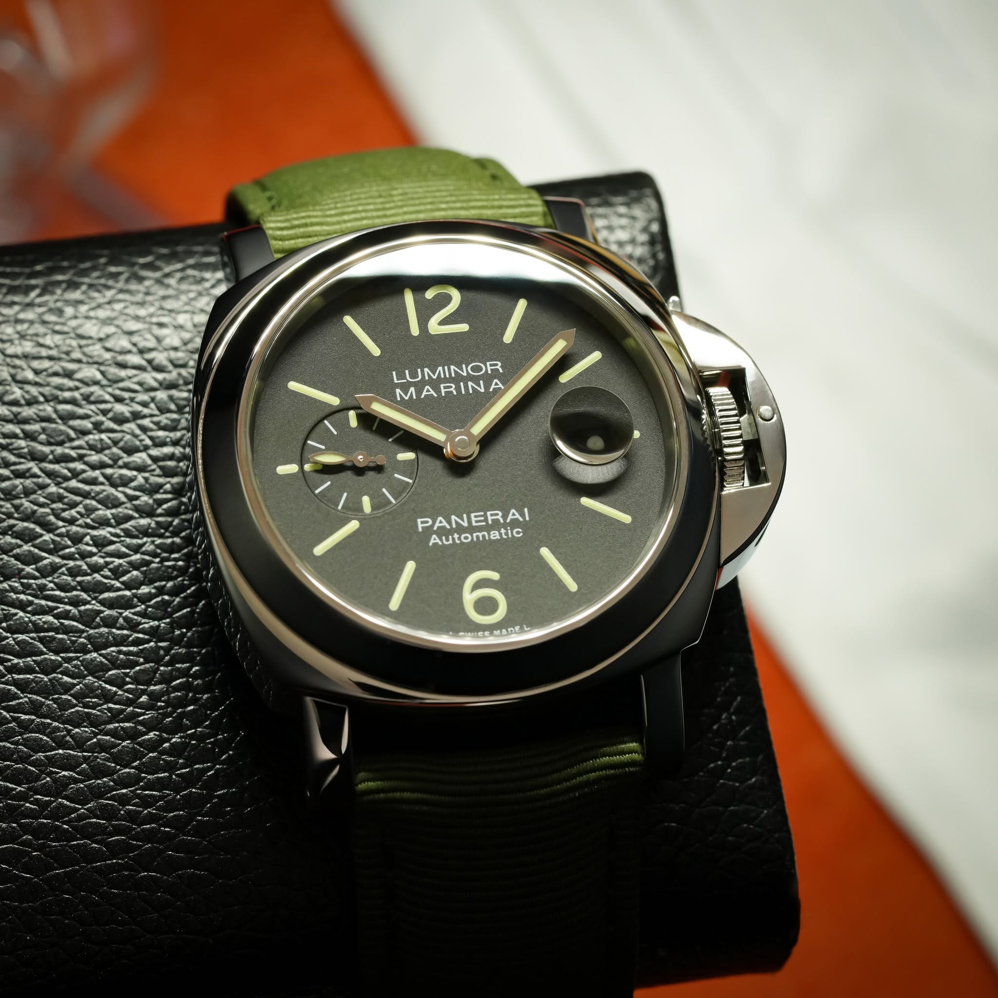 May be an image of wrist watch and text
