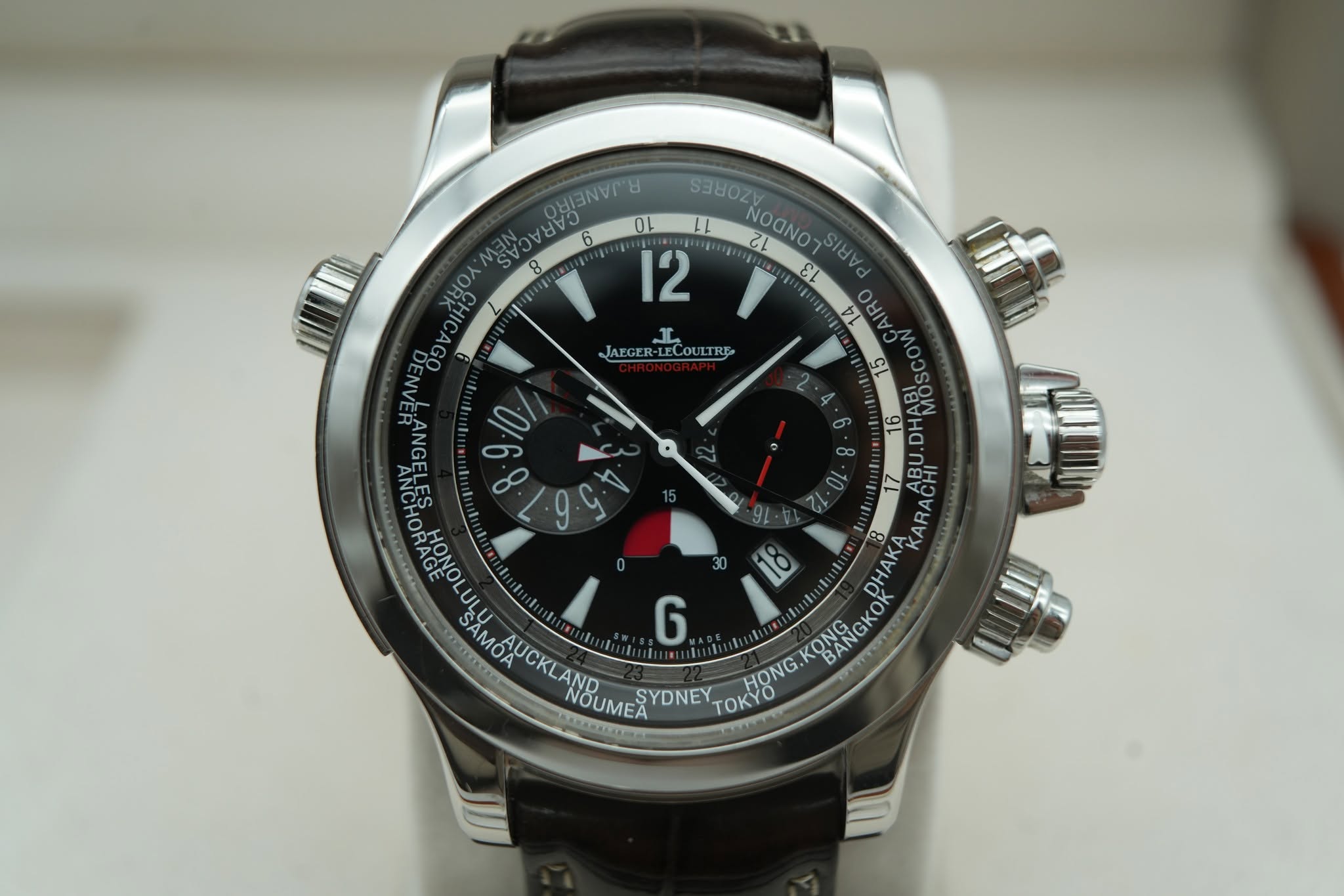 May be an image of wrist watch and text