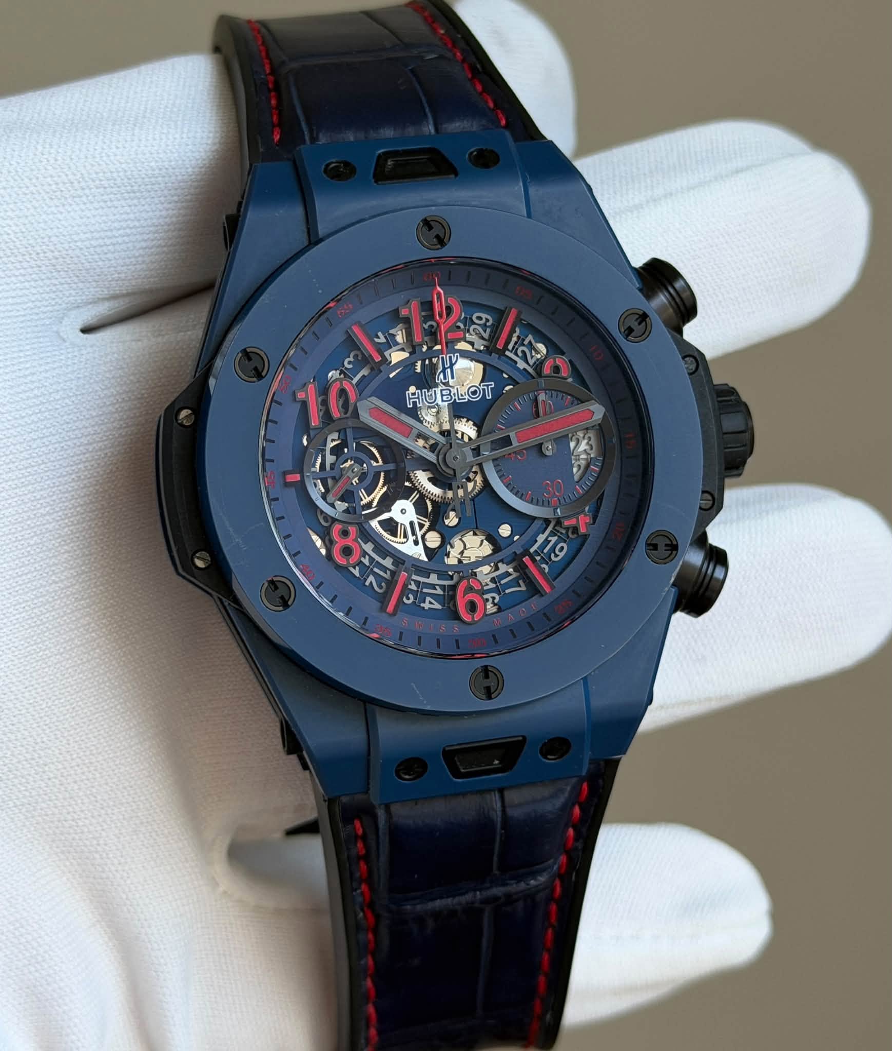 May be an image of wrist watch and text