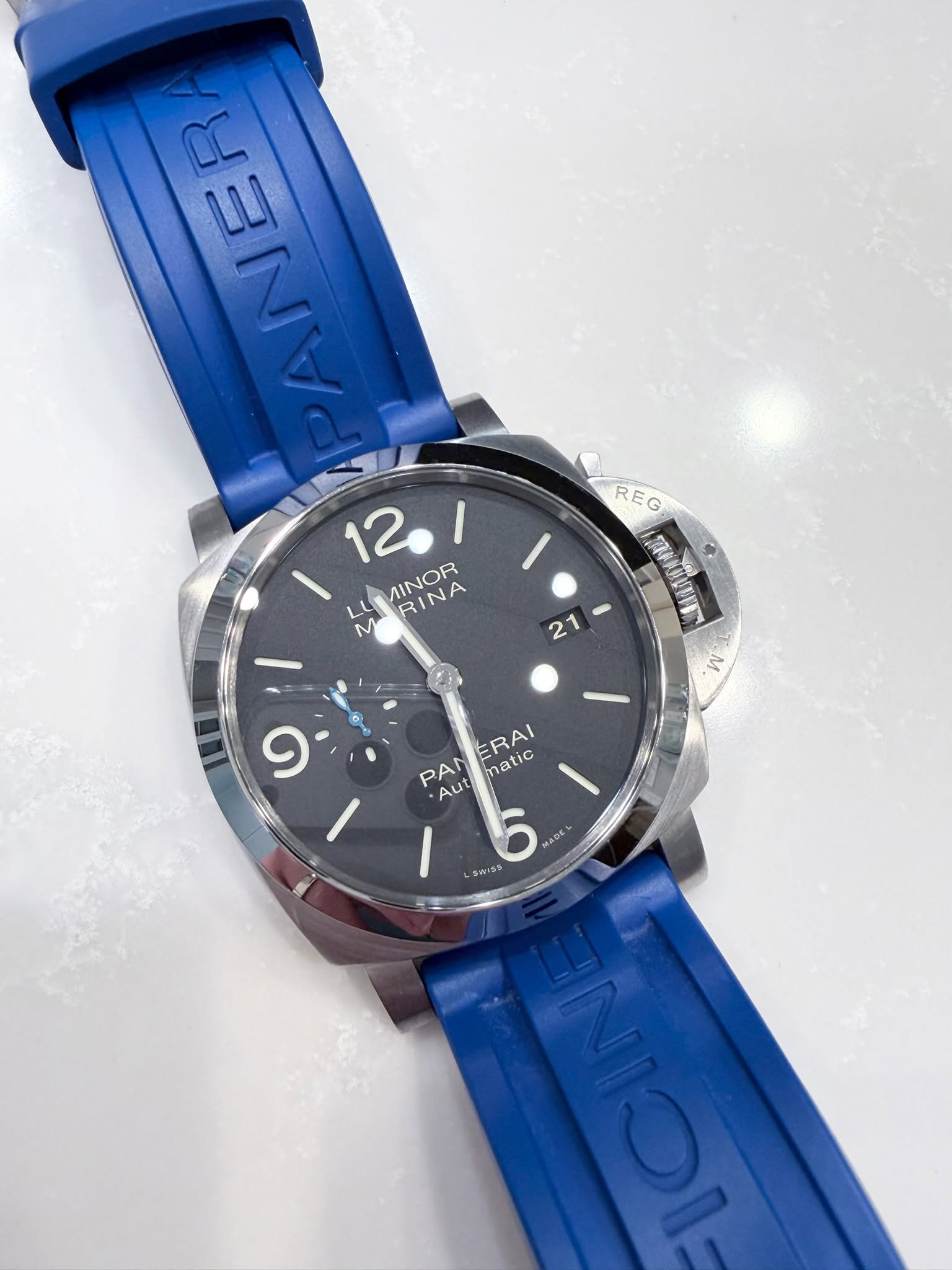 May be an image of wrist watch and text