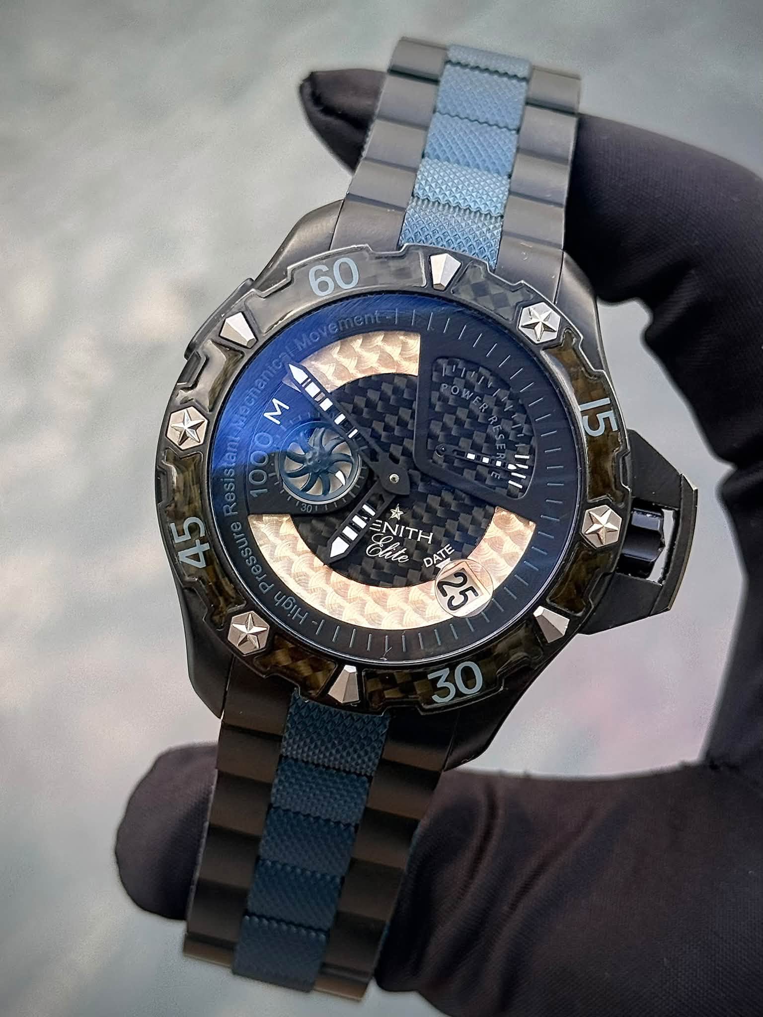 May be an image of wrist watch and text