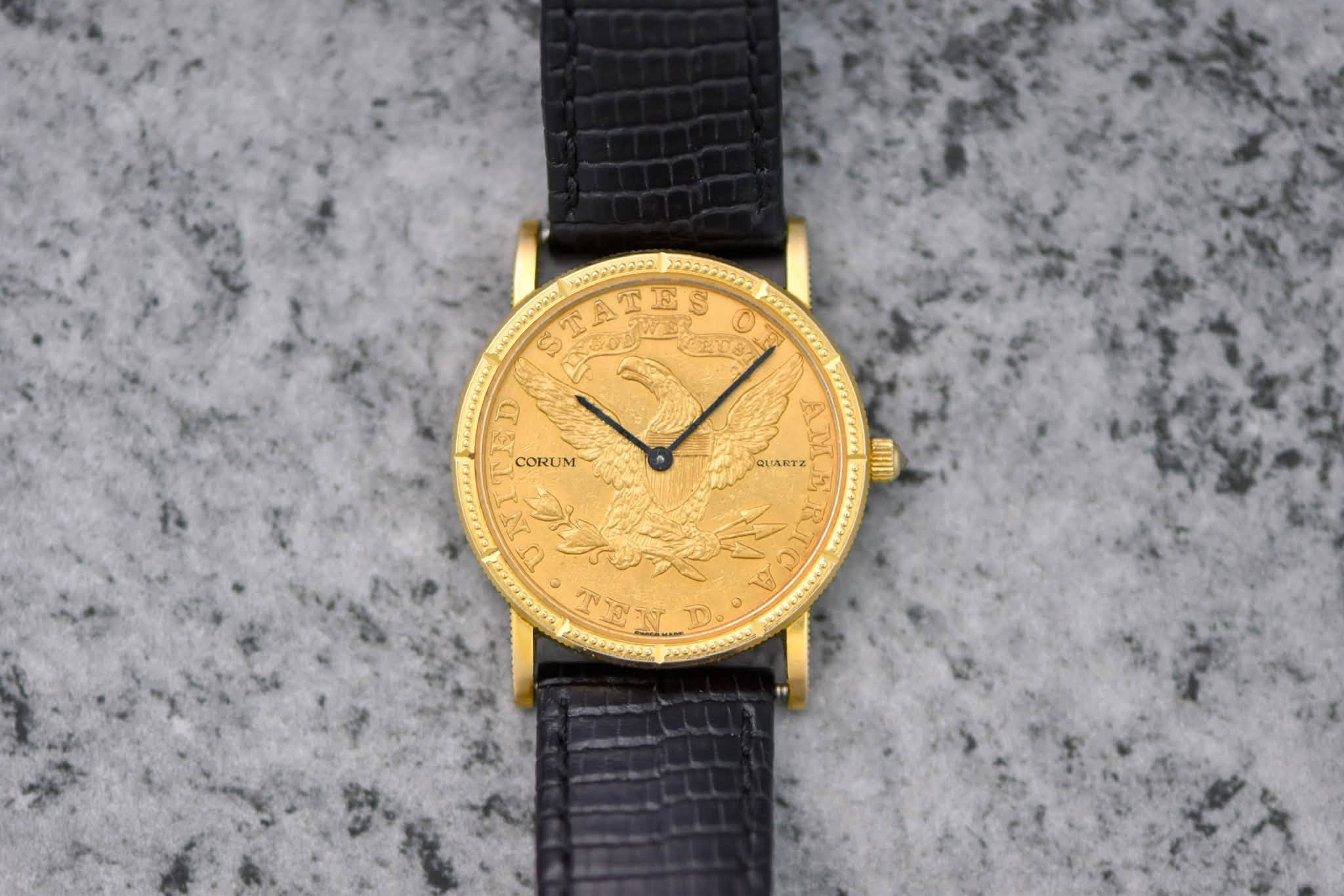 May be an image of wrist watch and text