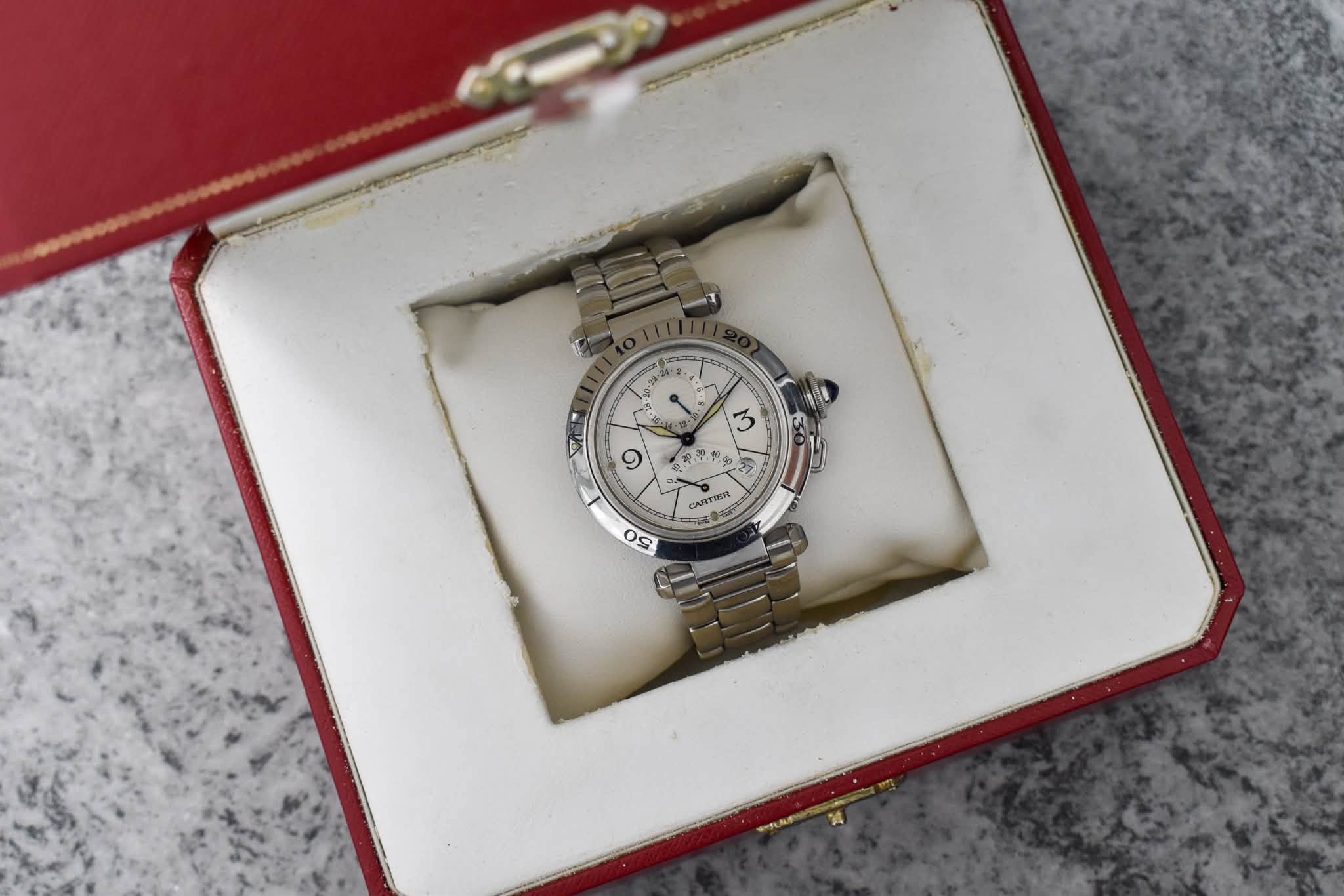 May be an image of wrist watch and text