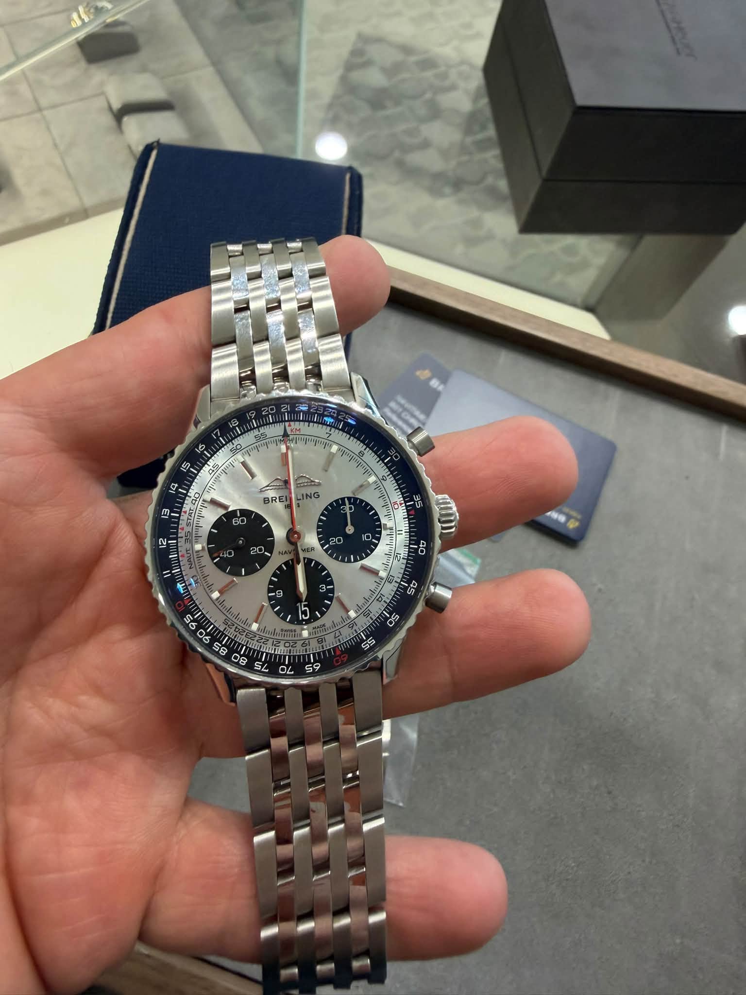 May be an image of wrist watch and text