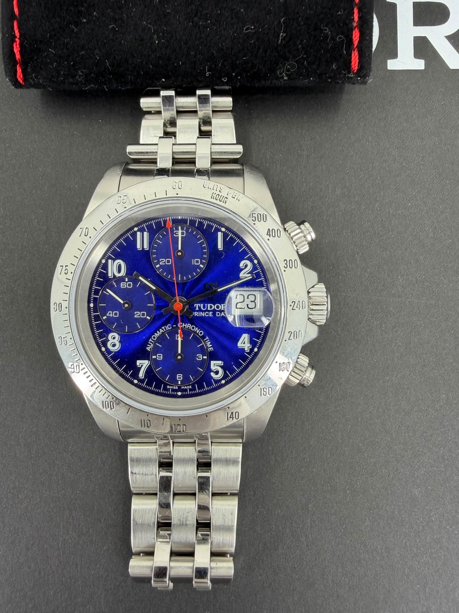 May be an image of wrist watch and text