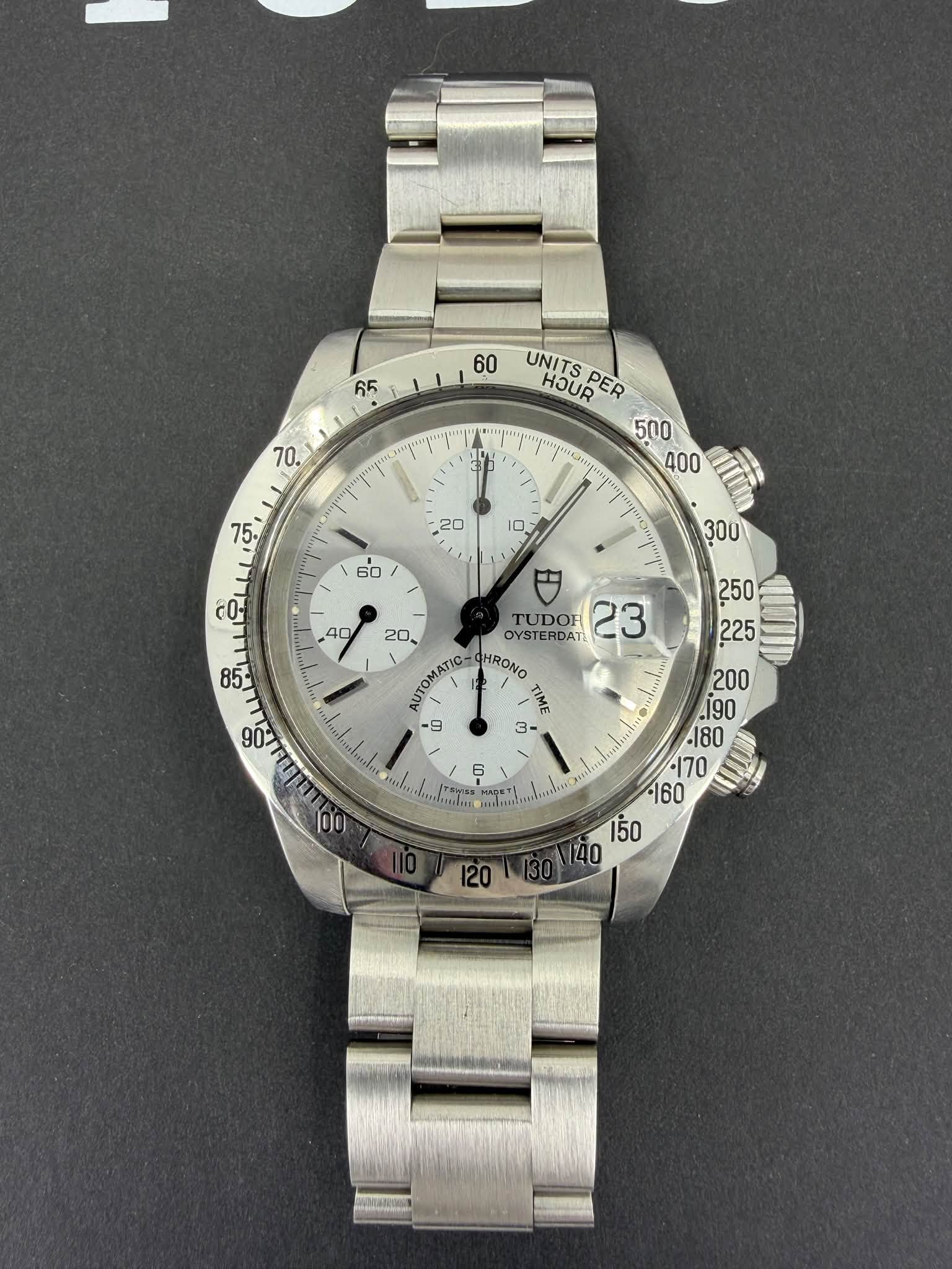 May be an image of wrist watch and text