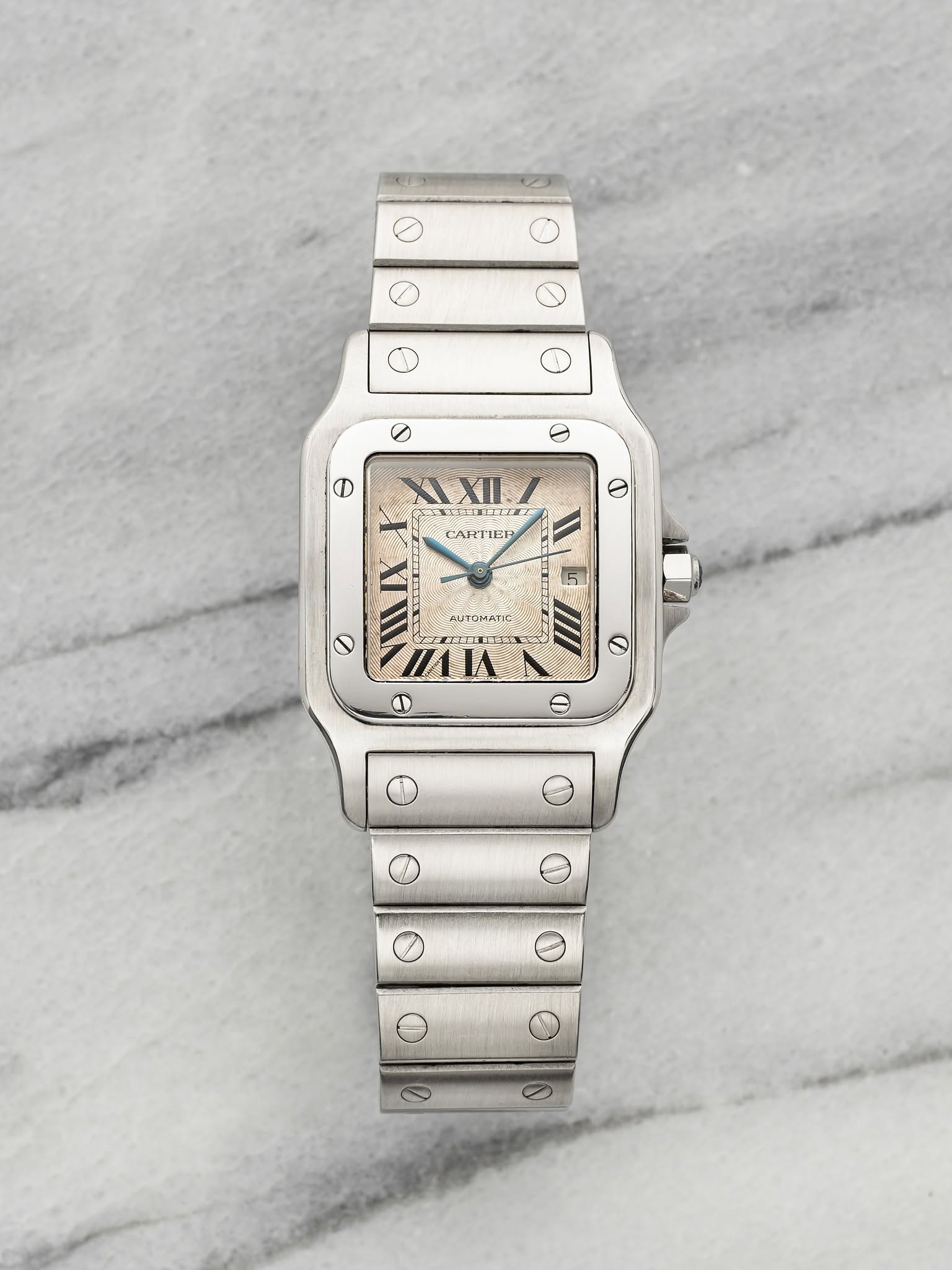 May be an image of digital watch and text