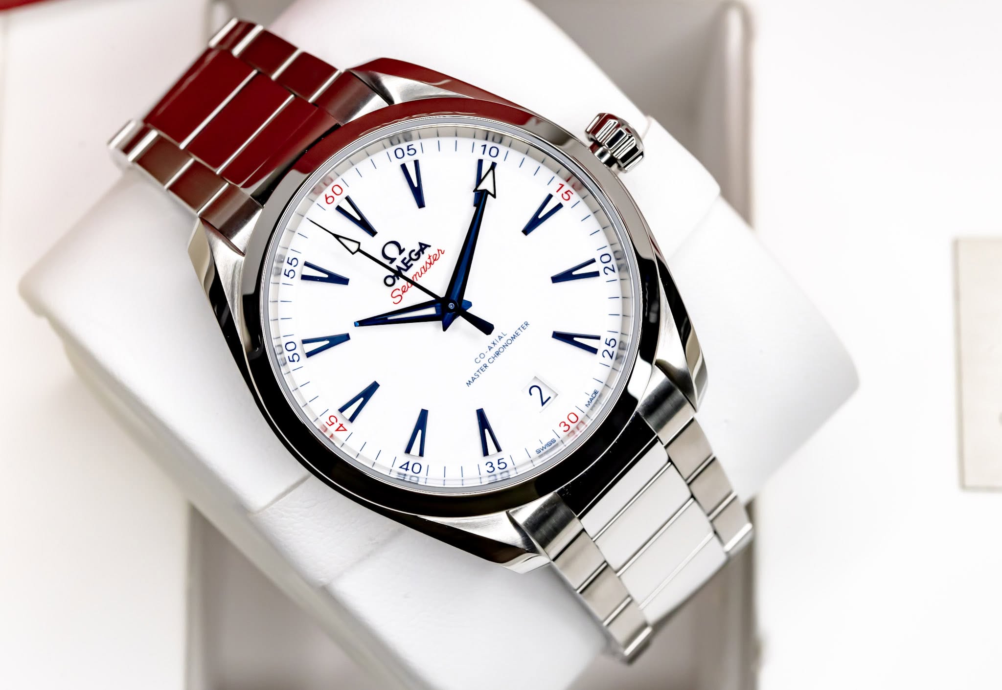 May be an image of wrist watch and text