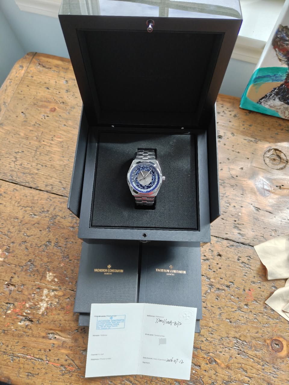 May be an image of wrist watch and text