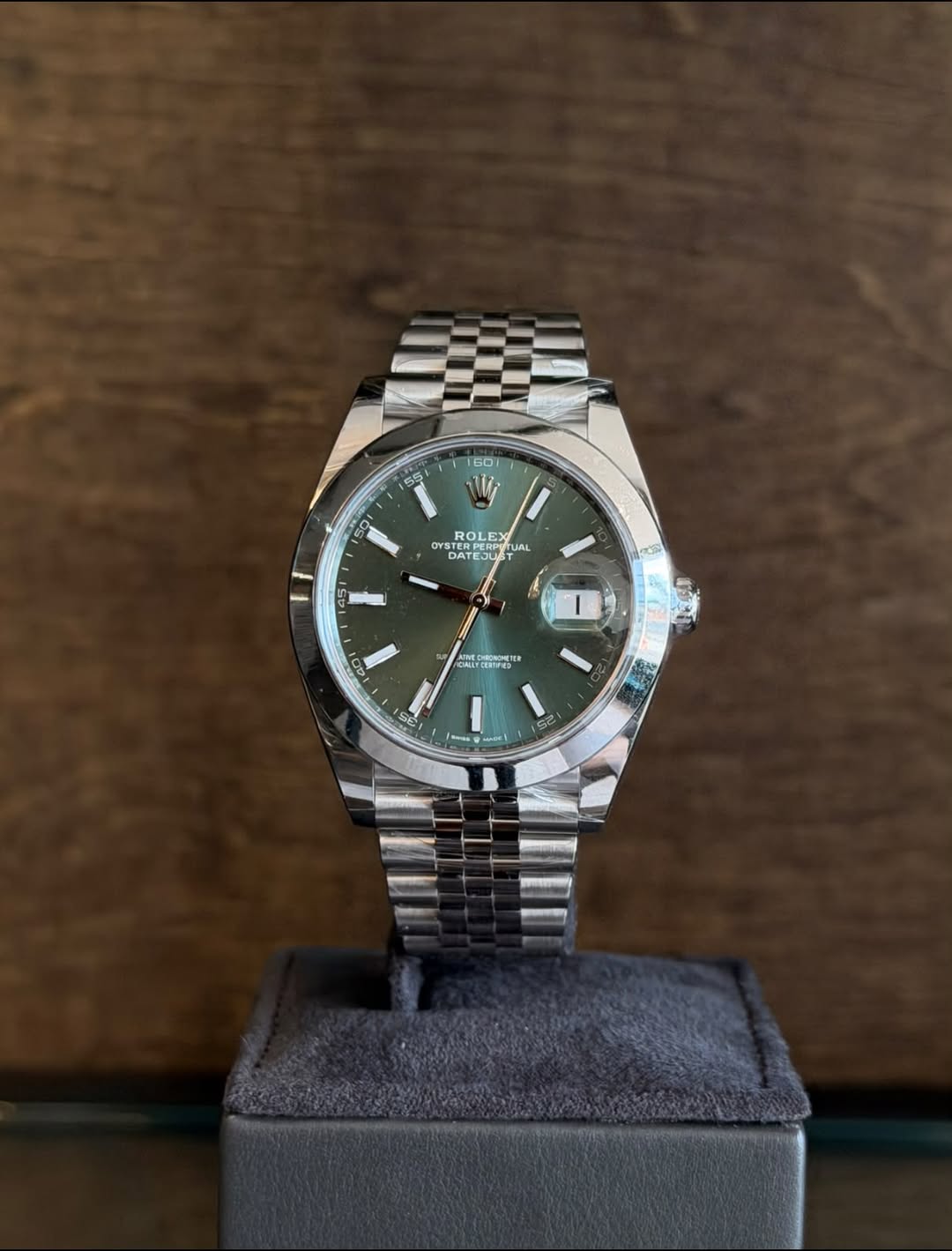 May be an image of wrist watch and text