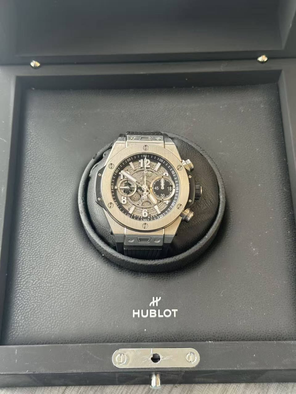 May be an image of wrist watch and text