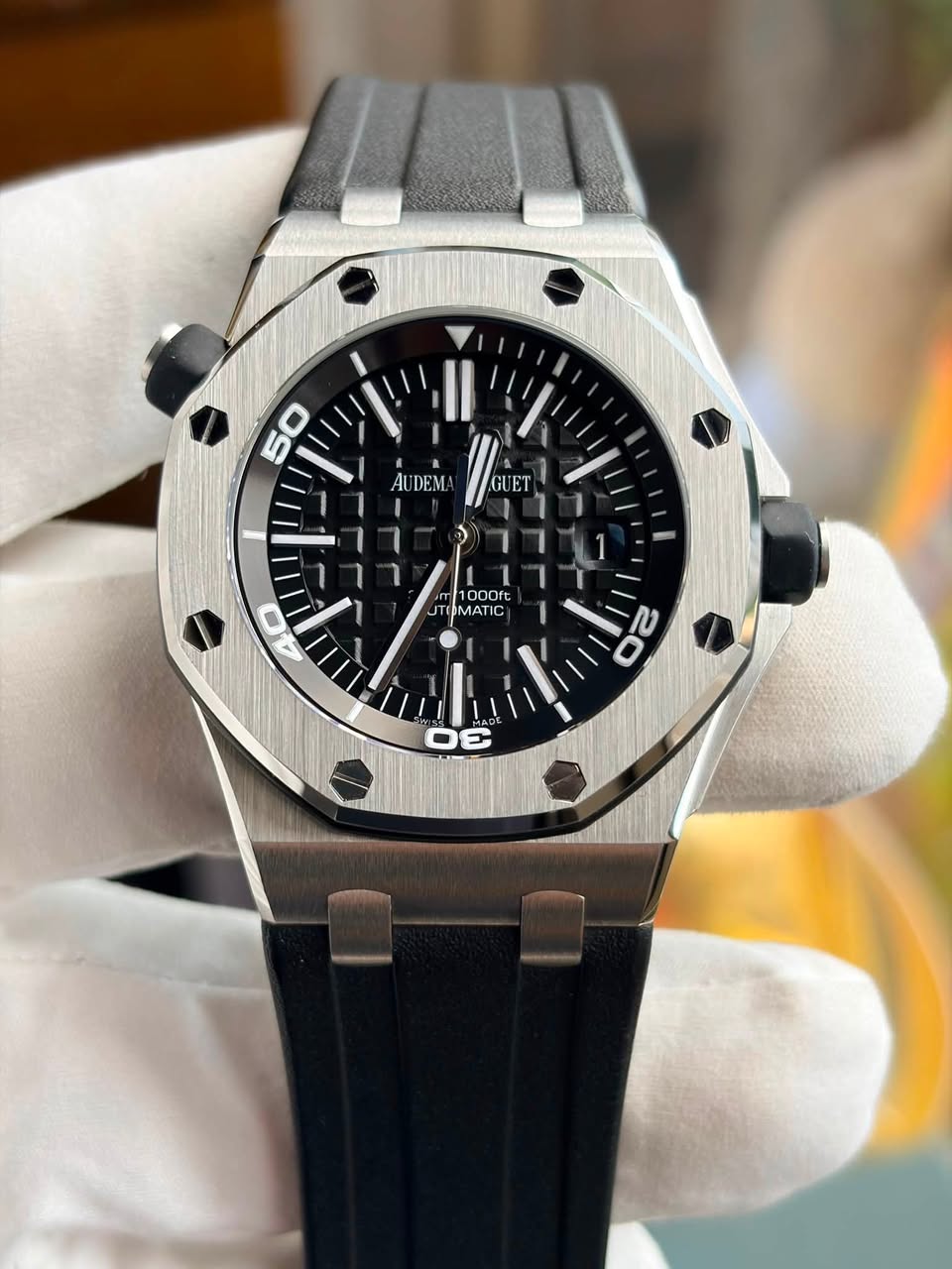 May be an image of wrist watch and text that says '50 AUDEM Maim GUET 1000ft JT MATIC MATIC 20 2 30 E G'