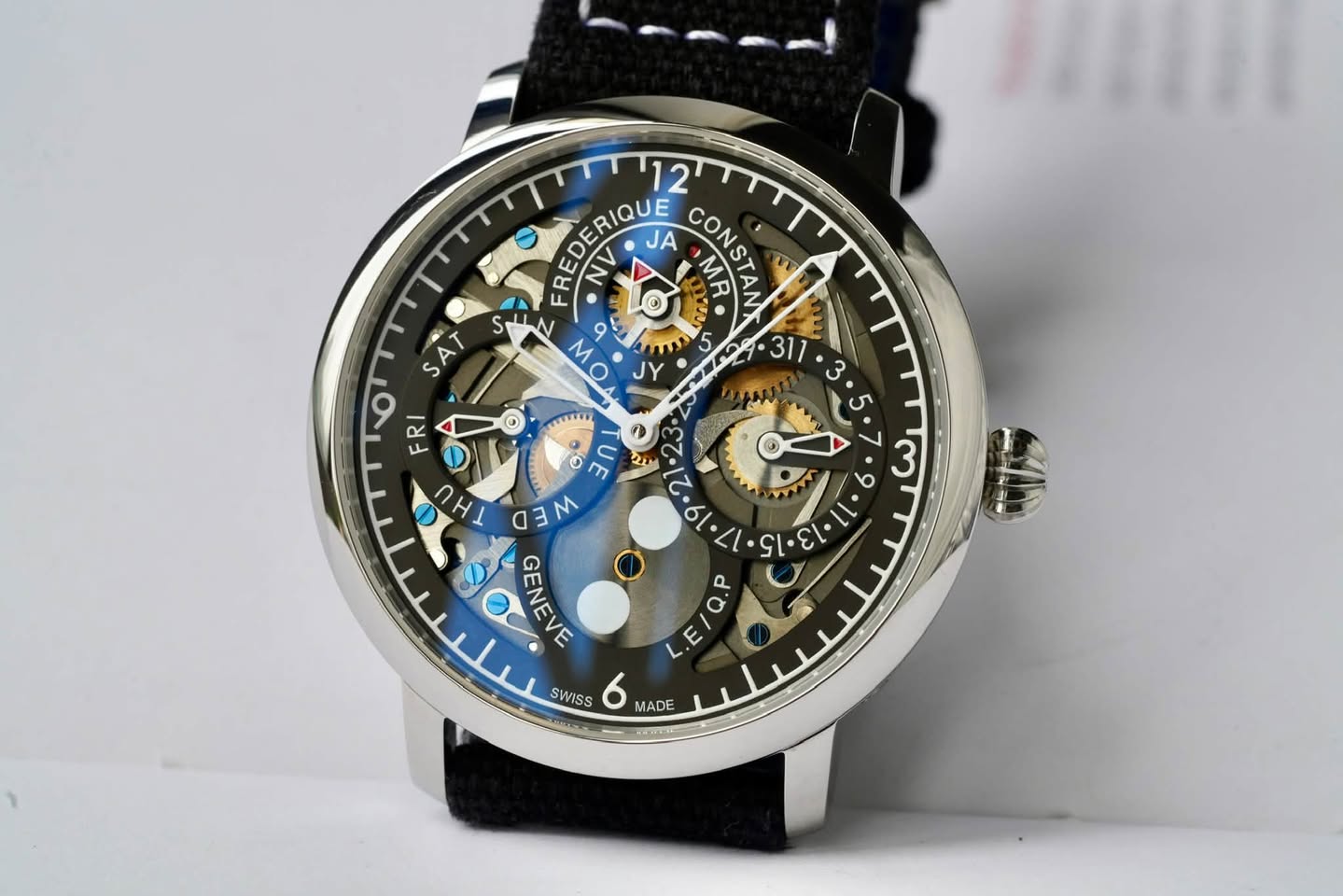 May be an image of wrist watch and text