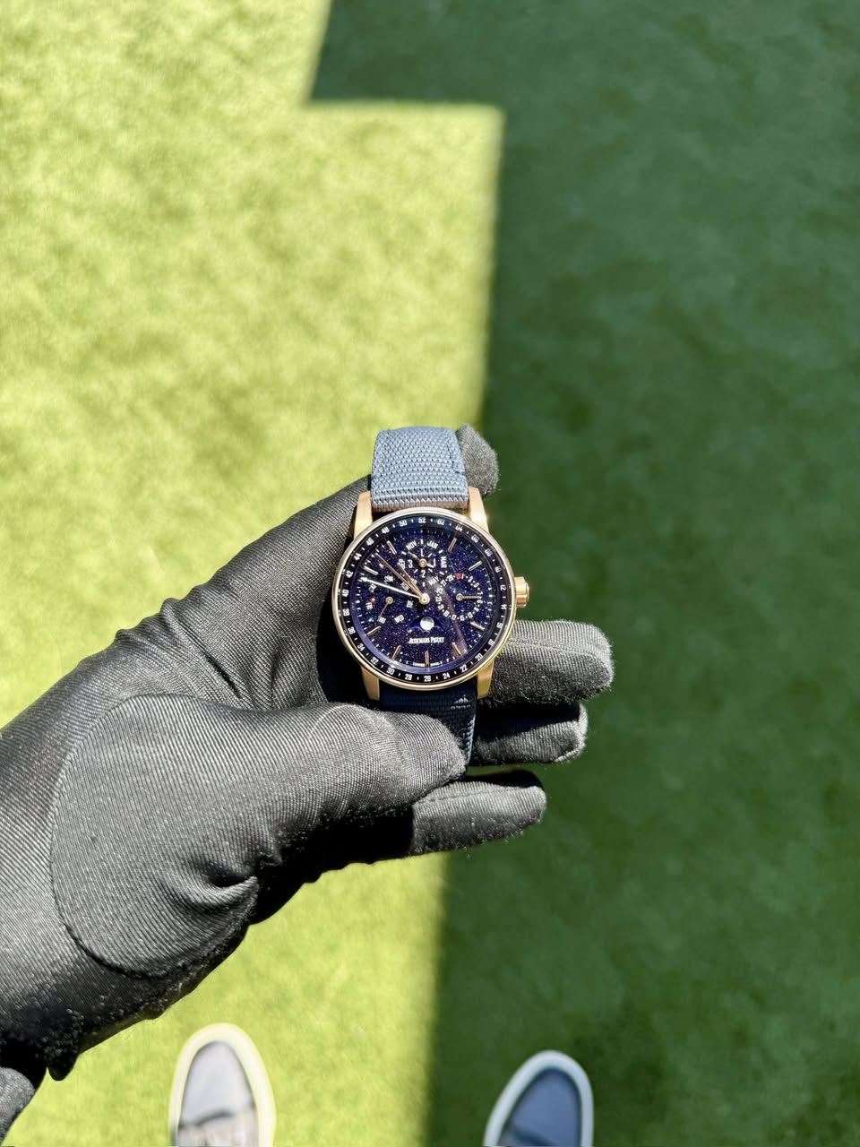 May be an image of wrist watch and text