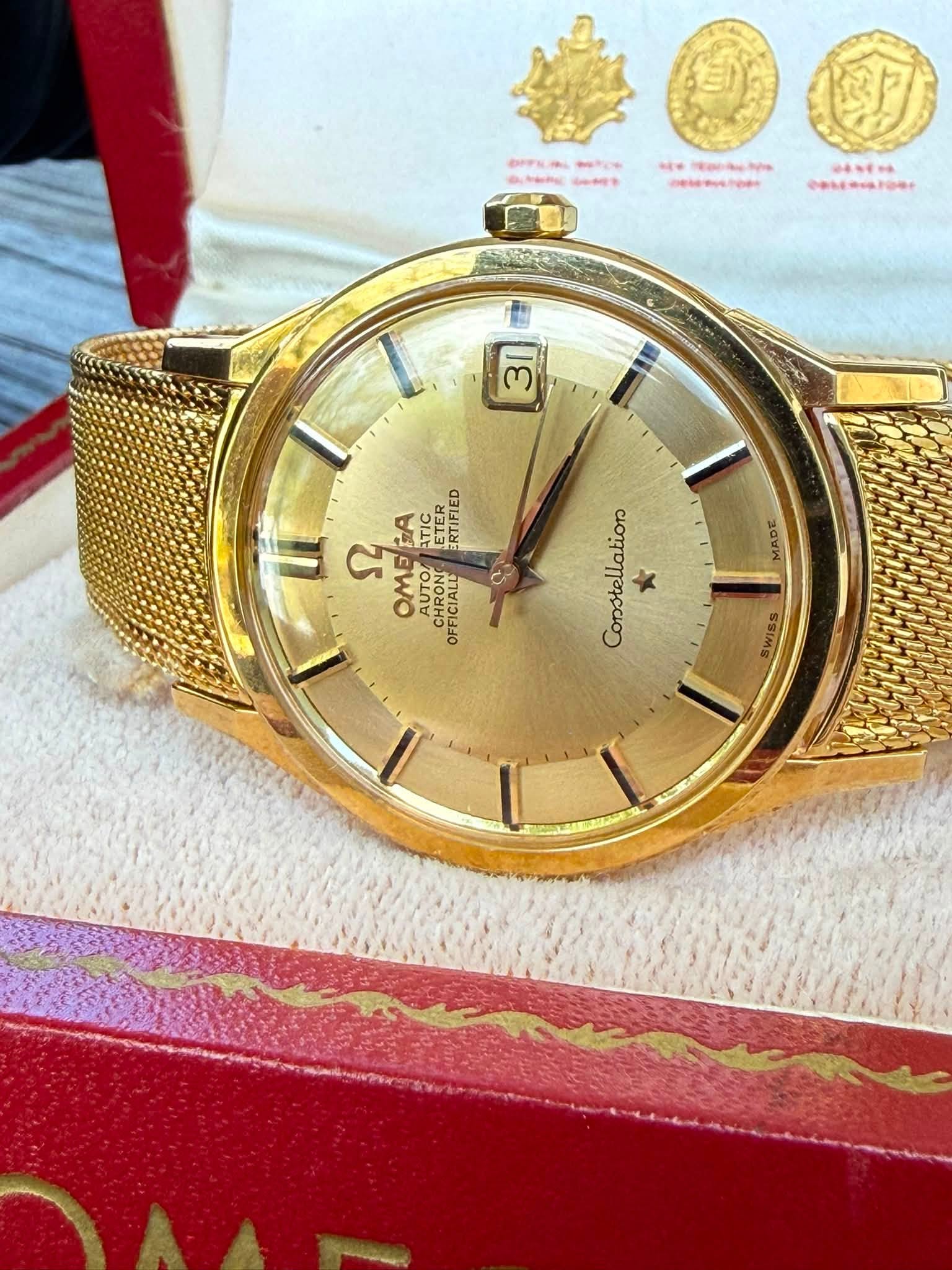 May be an image of wrist watch and text