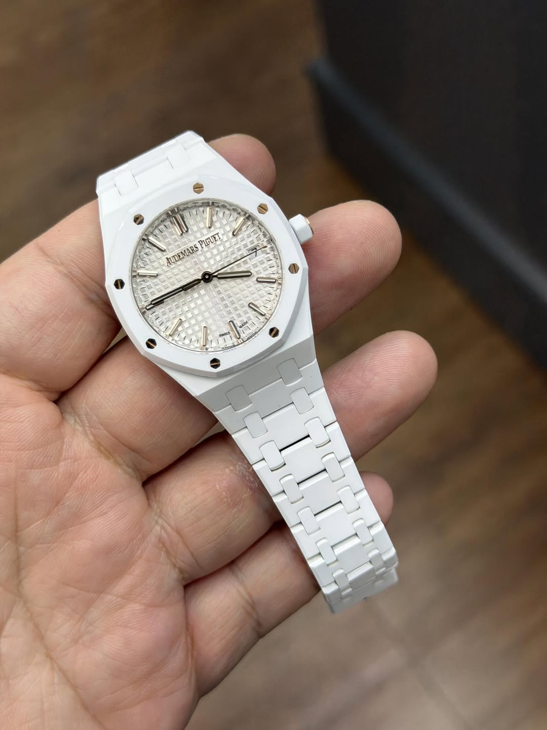 May be an image of wrist watch and text