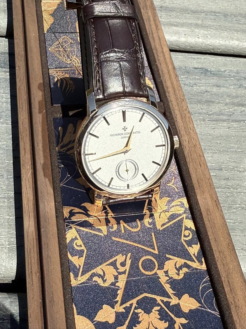 May be an image of wrist watch and text