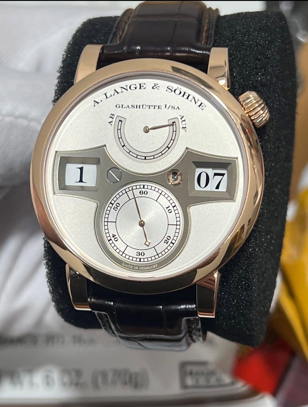 May be an image of wrist watch and text