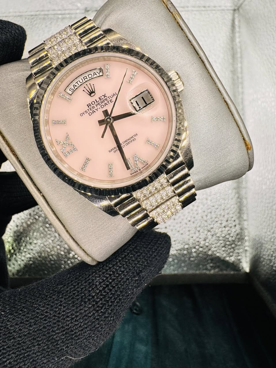 May be an image of wrist watch and text
