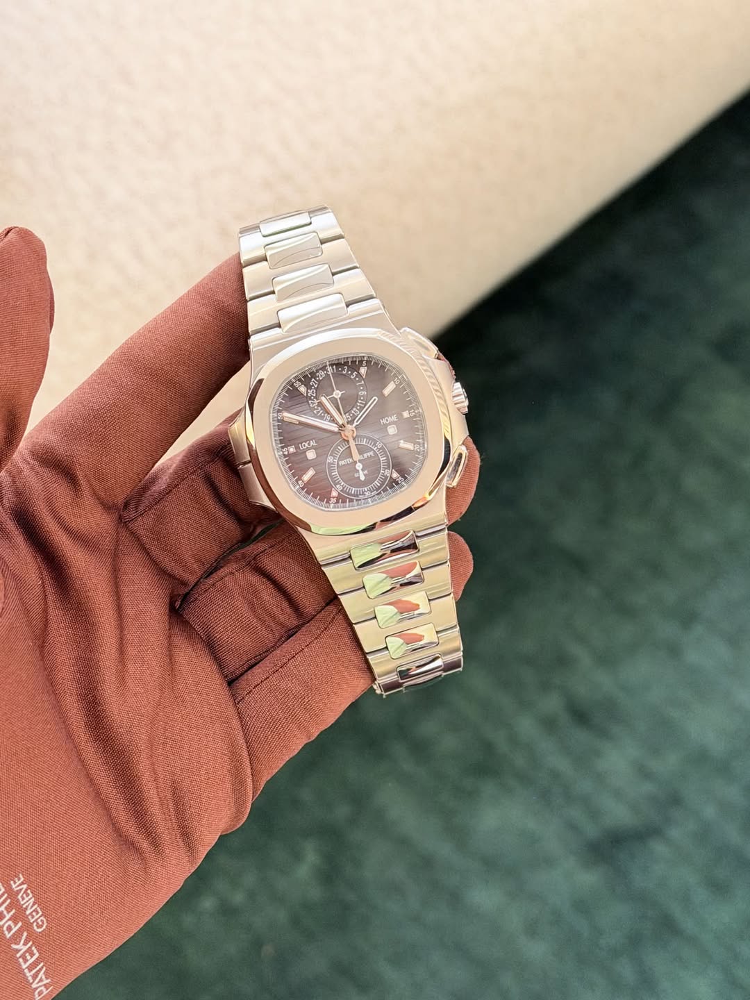 May be an image of wrist watch and text