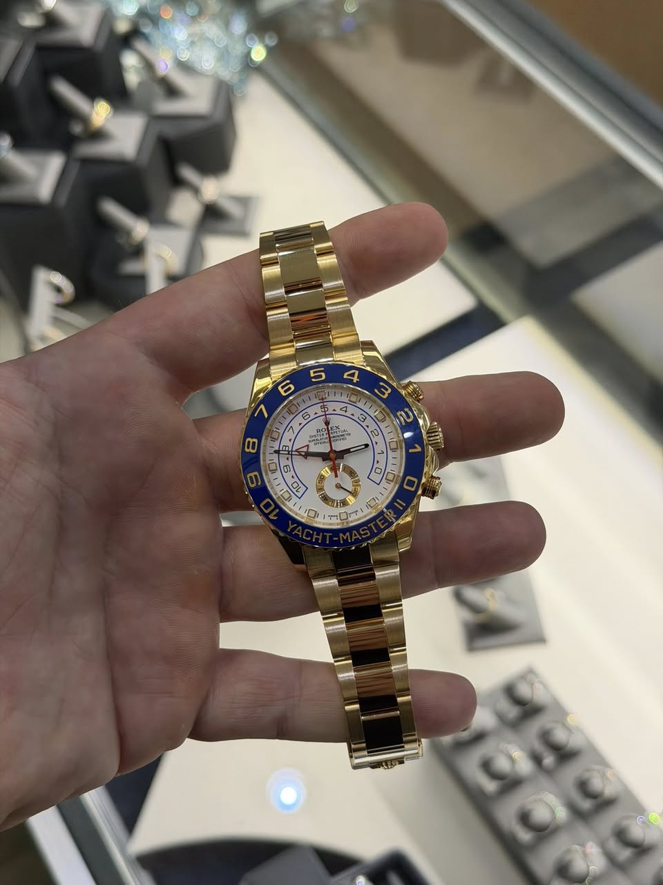 May be an image of wrist watch and text