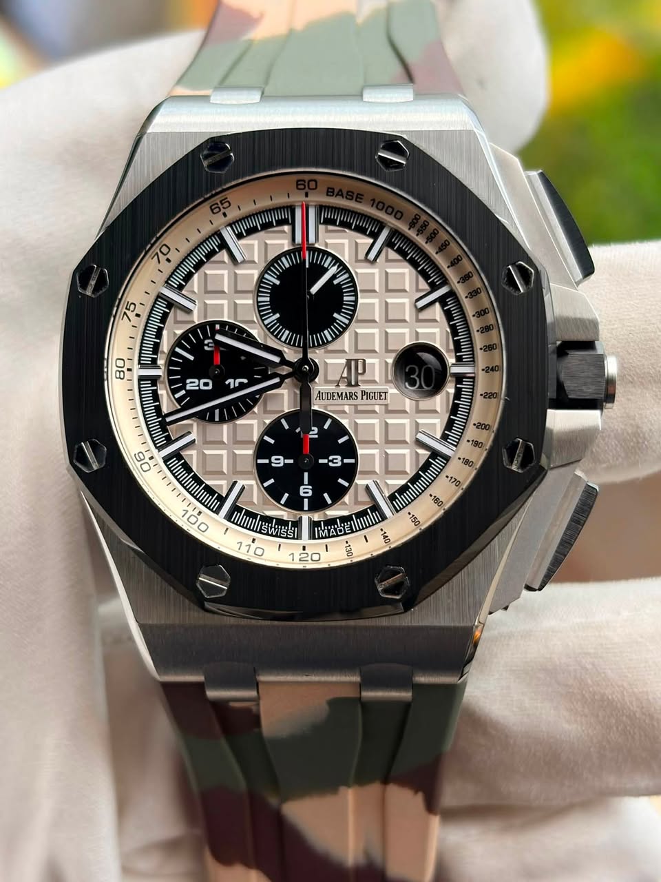 May be an image of wrist watch and text