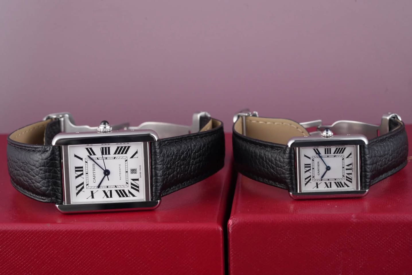 May be an image of wrist watch, leather and text
