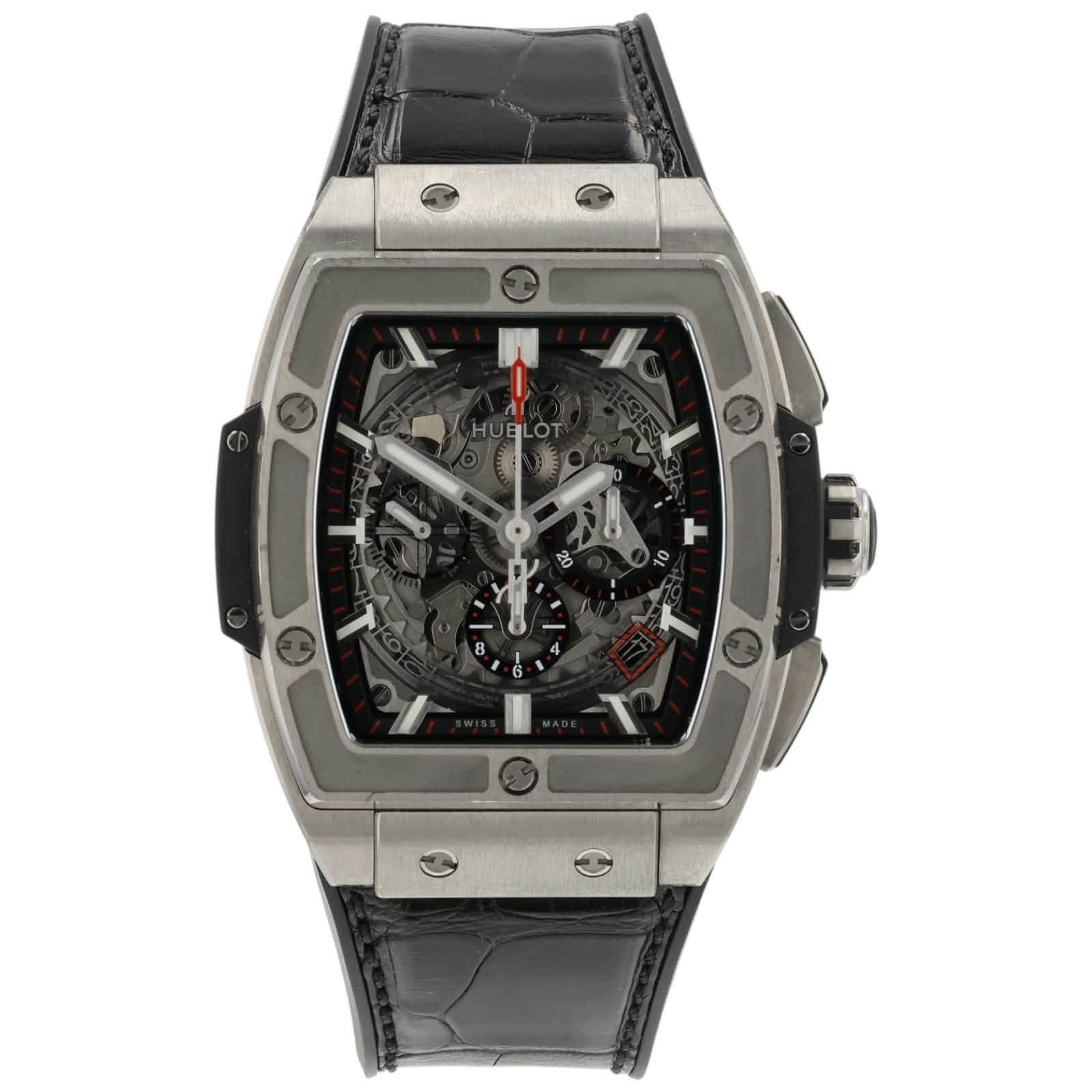 May be an image of wrist watch and text that says 'HUBLOT + 1 T'