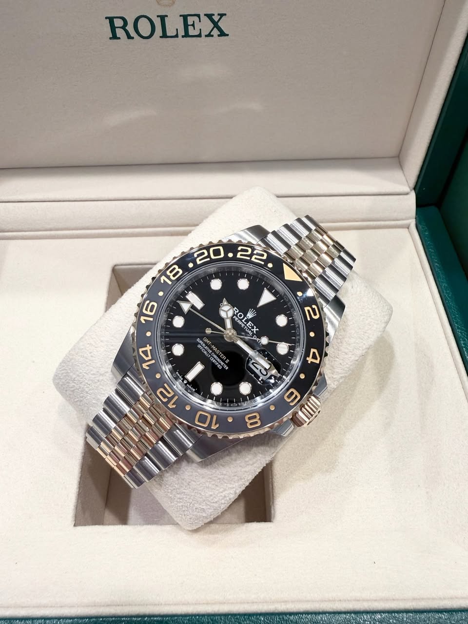 May be an image of wrist watch and text