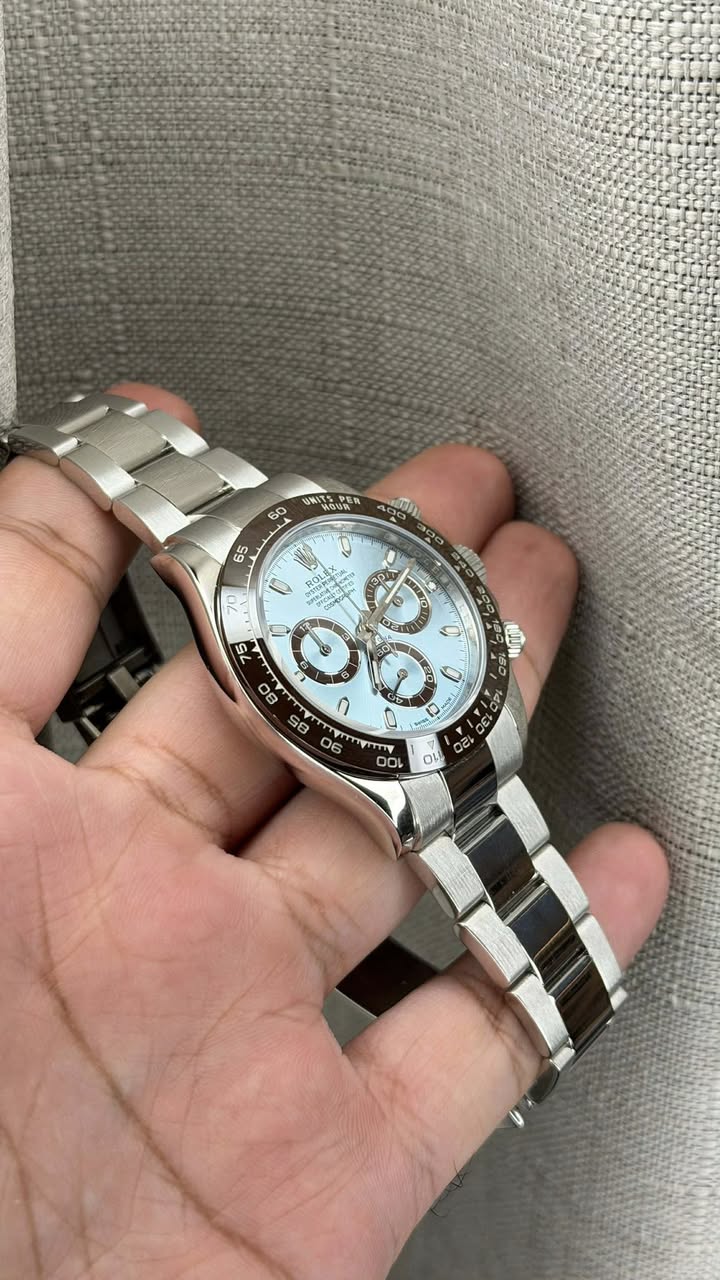May be an image of wrist watch and text