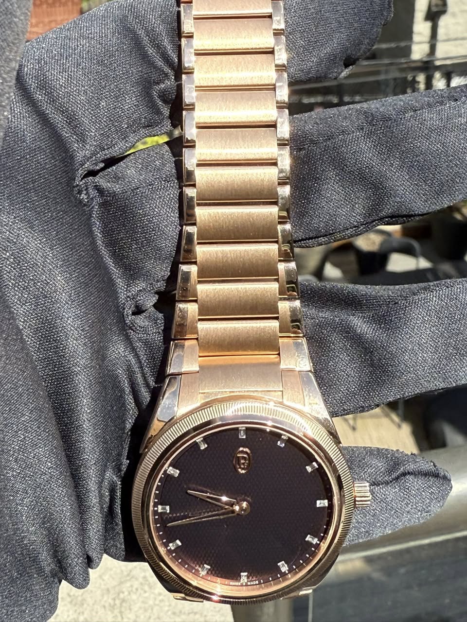 May be an image of wrist watch and text