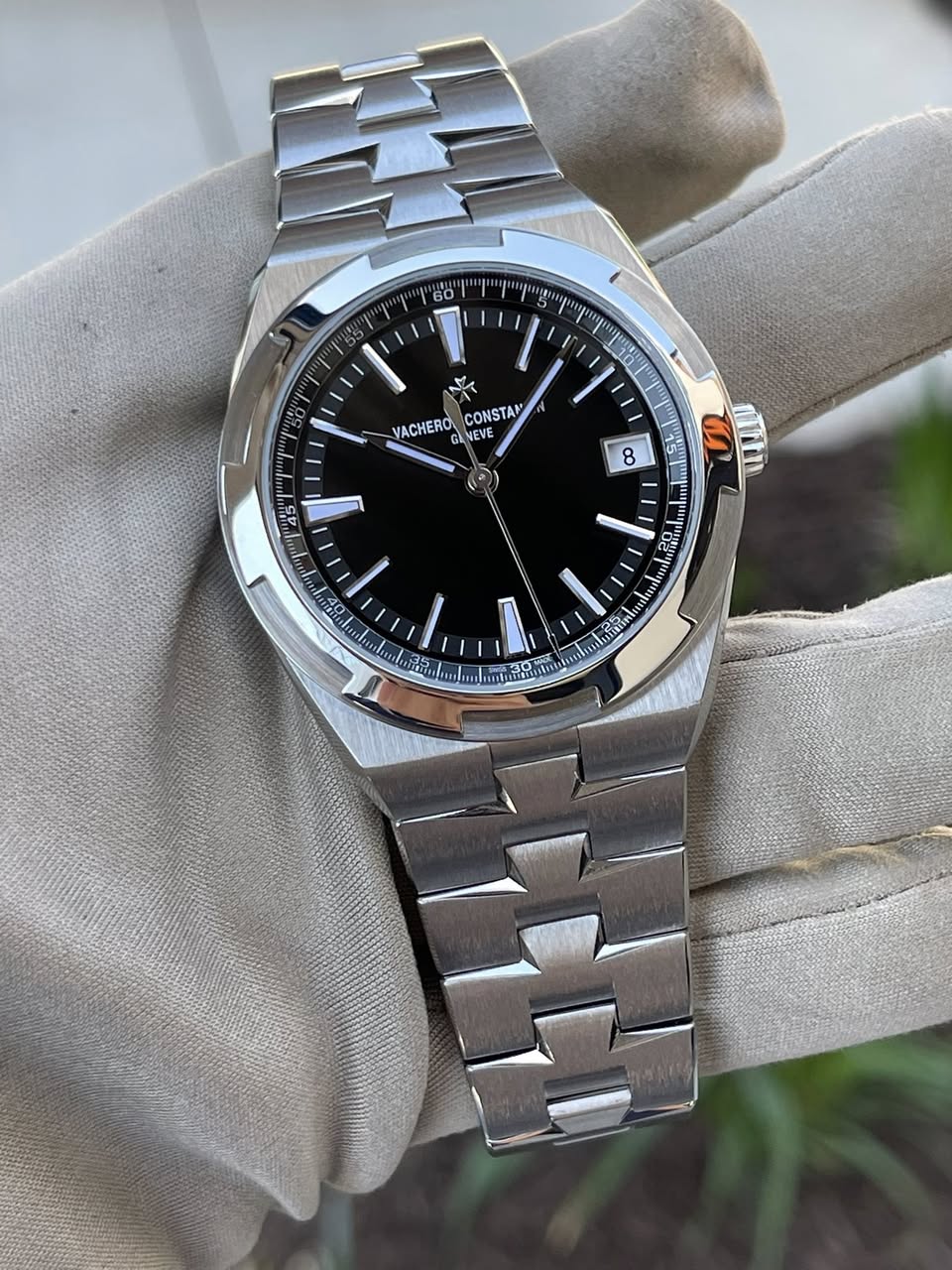 May be an image of wrist watch and text