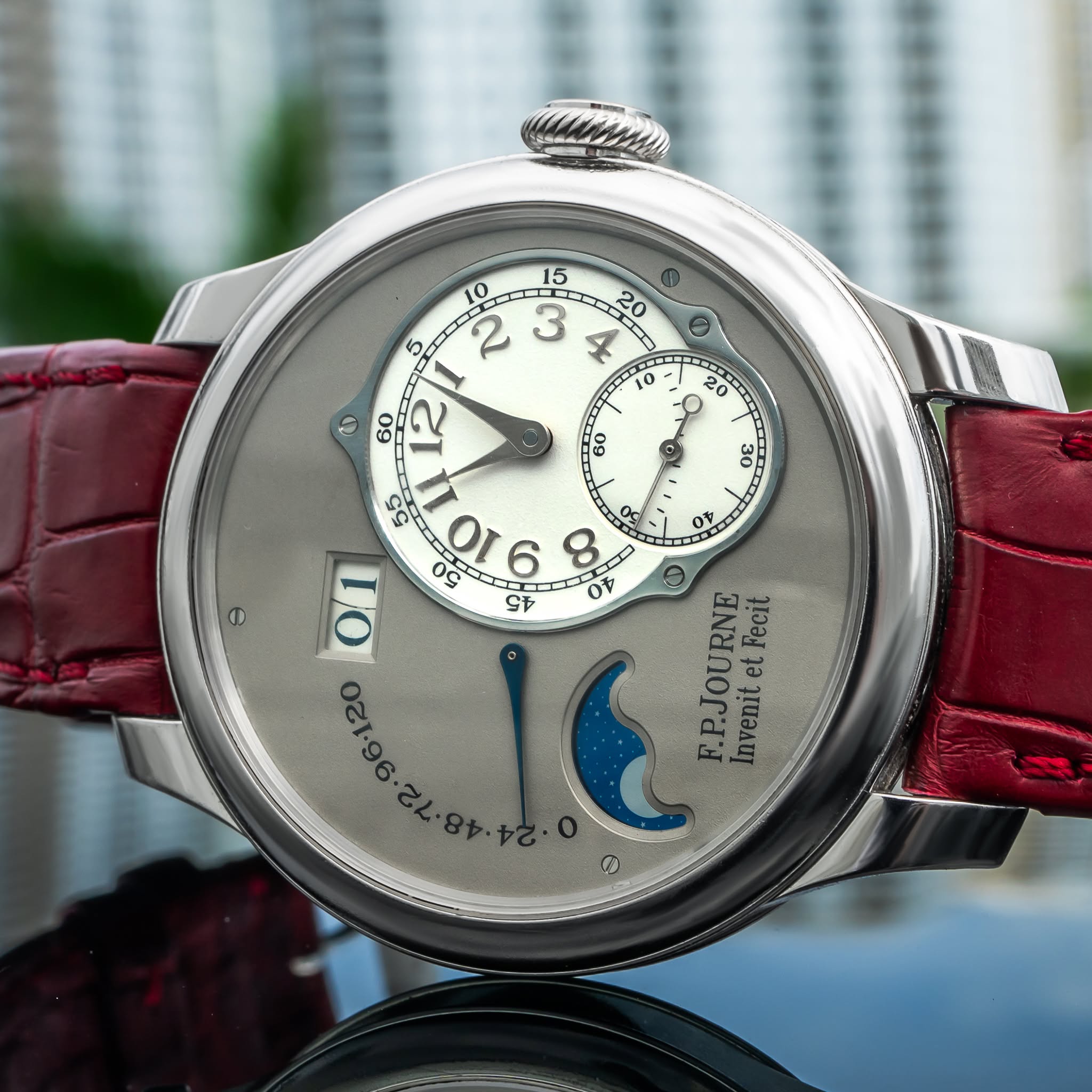 May be an image of wrist watch and text