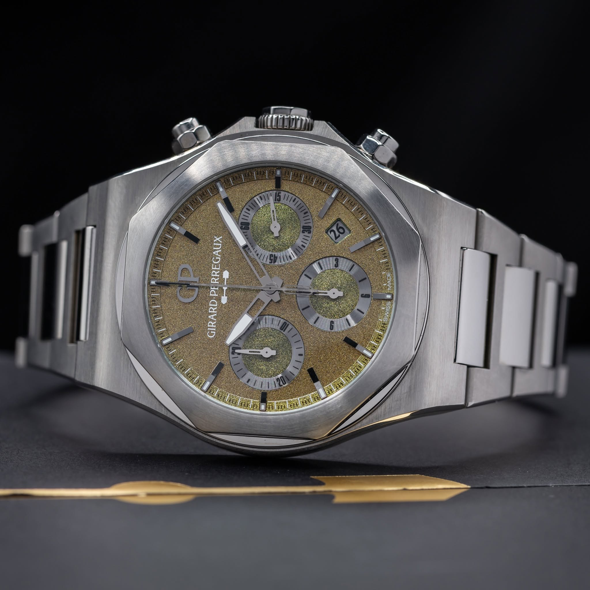 May be an image of wrist watch and text
