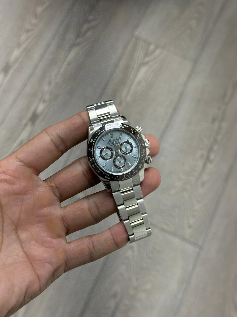 May be an image of wrist watch and text