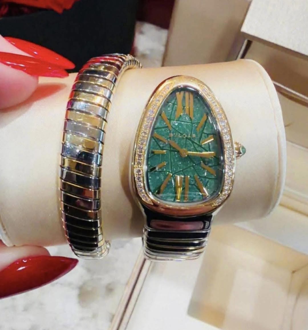 May be an image of jewelry and wrist watch