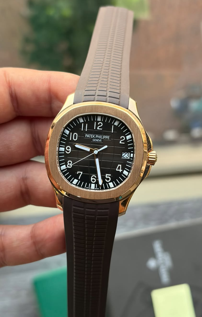 May be an image of wrist watch and text that says ' PATEK PATEKPHILIPP PHILIPPE GENEVE PATEKPHILIPPE NEME /'