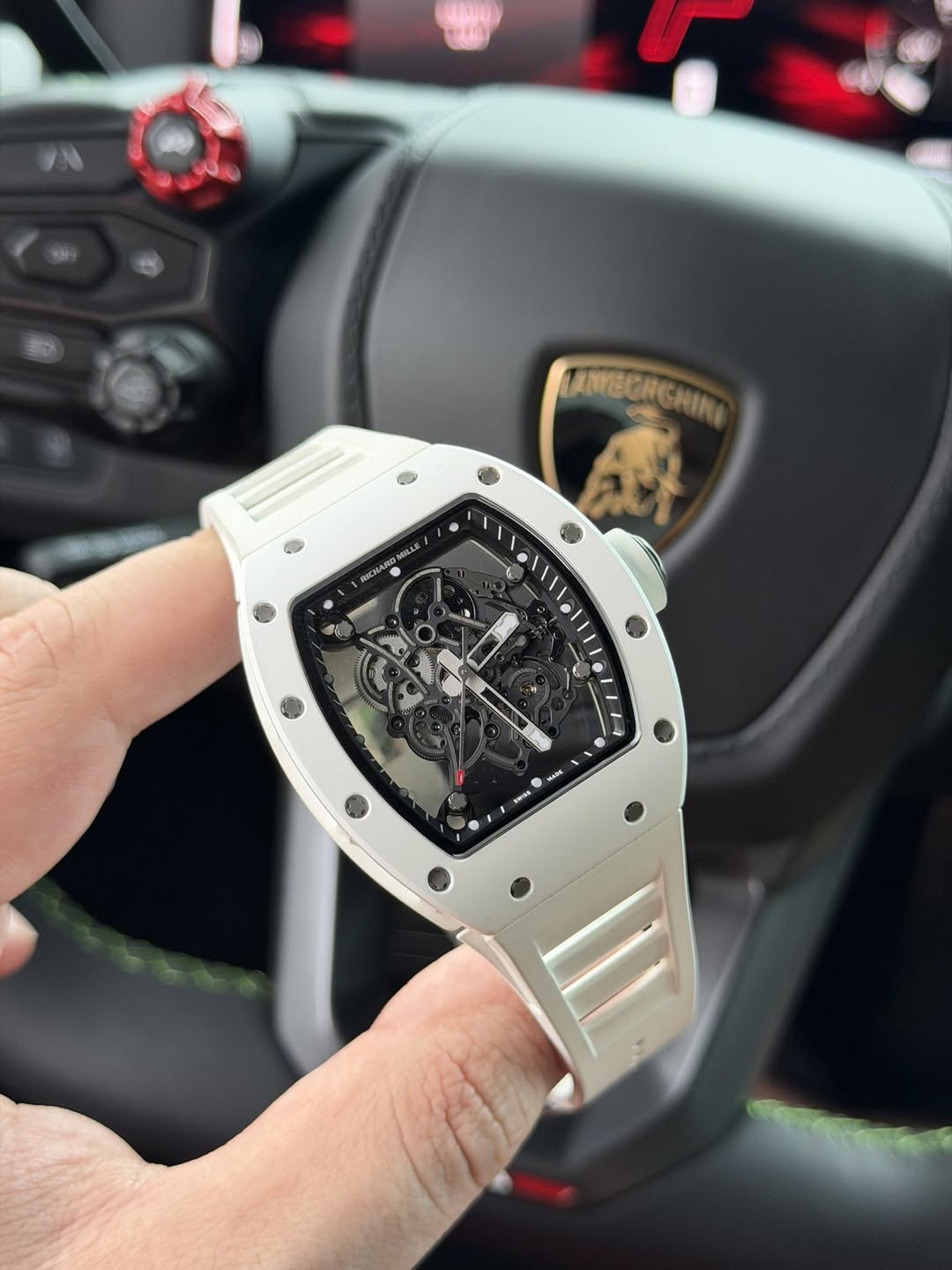 May be an image of wrist watch and text