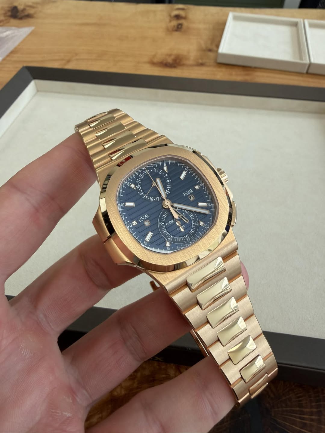 May be an image of wrist watch and text