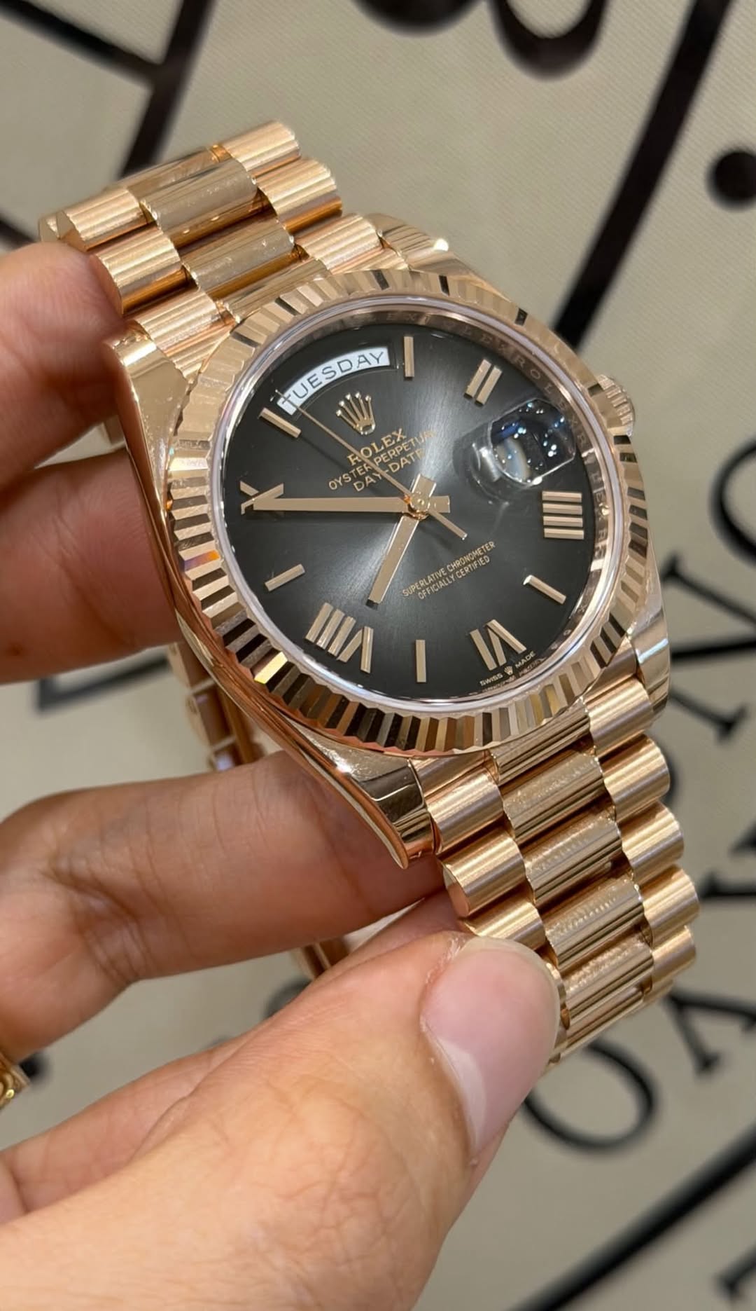 May be an image of wrist watch and text