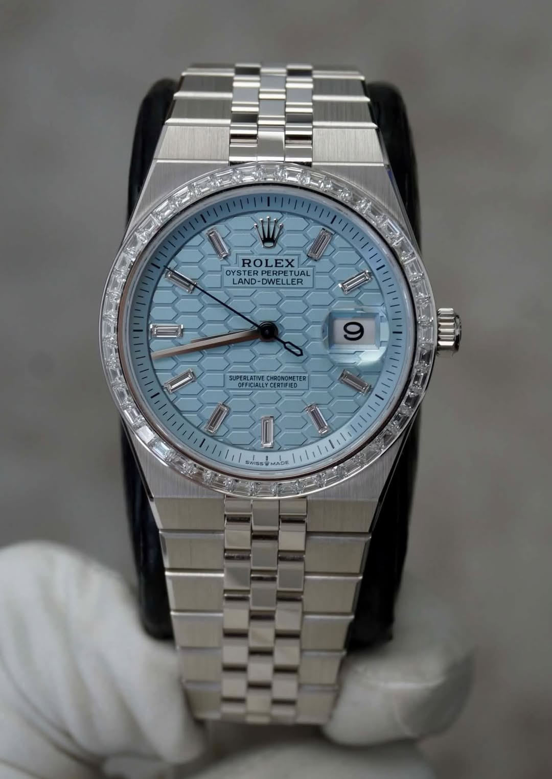 May be an image of wrist watch and text that says 'زس ROLEXA PERPETU PERPET ROLEX OYSTER LAD-DLLUAL STERPERP ERPETUAI TUAL LAND- DWELLER 0 I 9 9 SUPEBLATINE.CHRONOMETER…